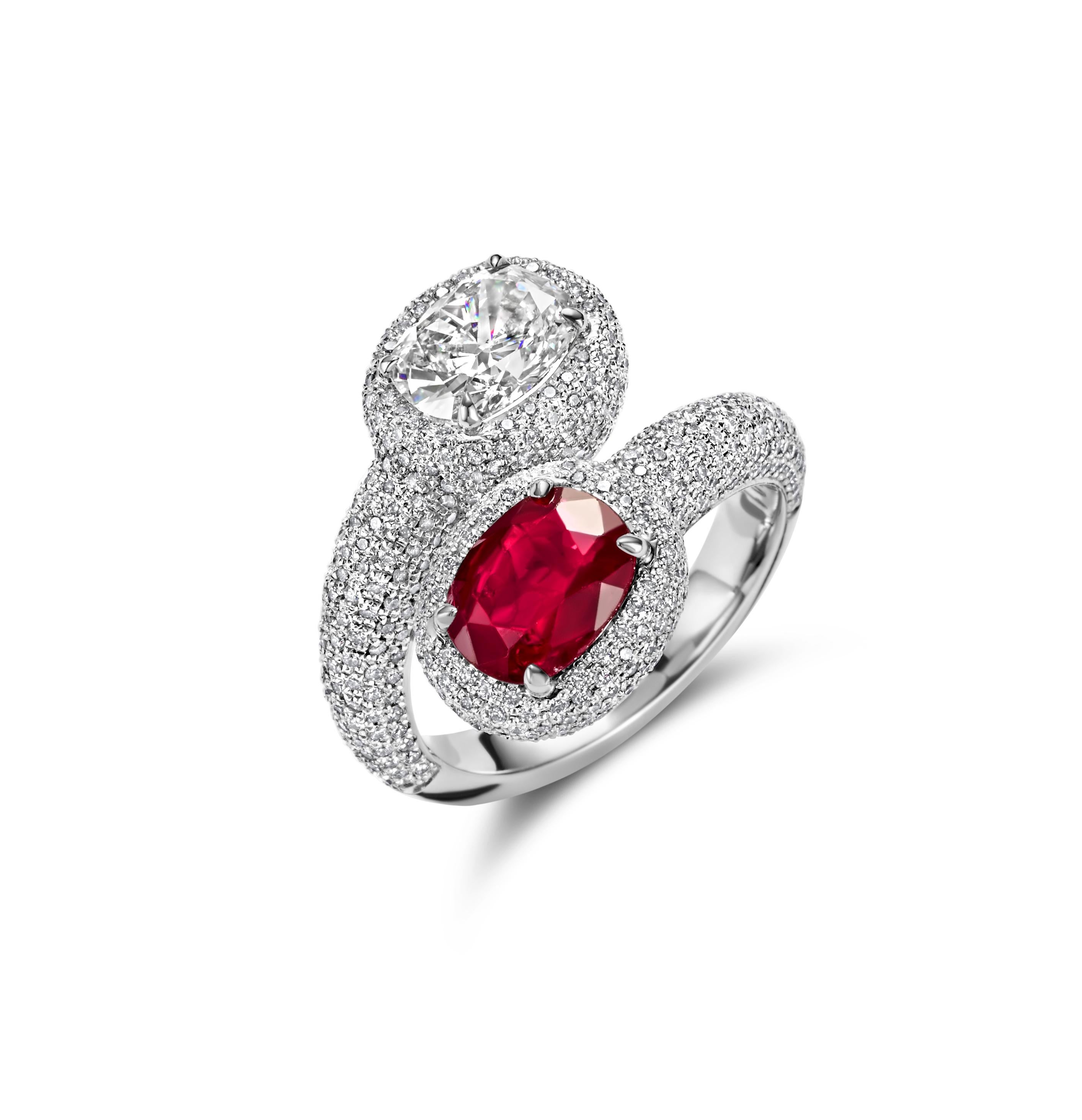Gorgeous Platinum Toi et Moi Ring With Ruby and Diamond

Ruby: Cushion shape Siam ruby 2.40ct, intense red, Comes with Carat Gem Lab certificate

Diamonds: Cushion shape diamond 1.55ct G SI1 Comes with a  HRD Antwerp certificate

Material: 950