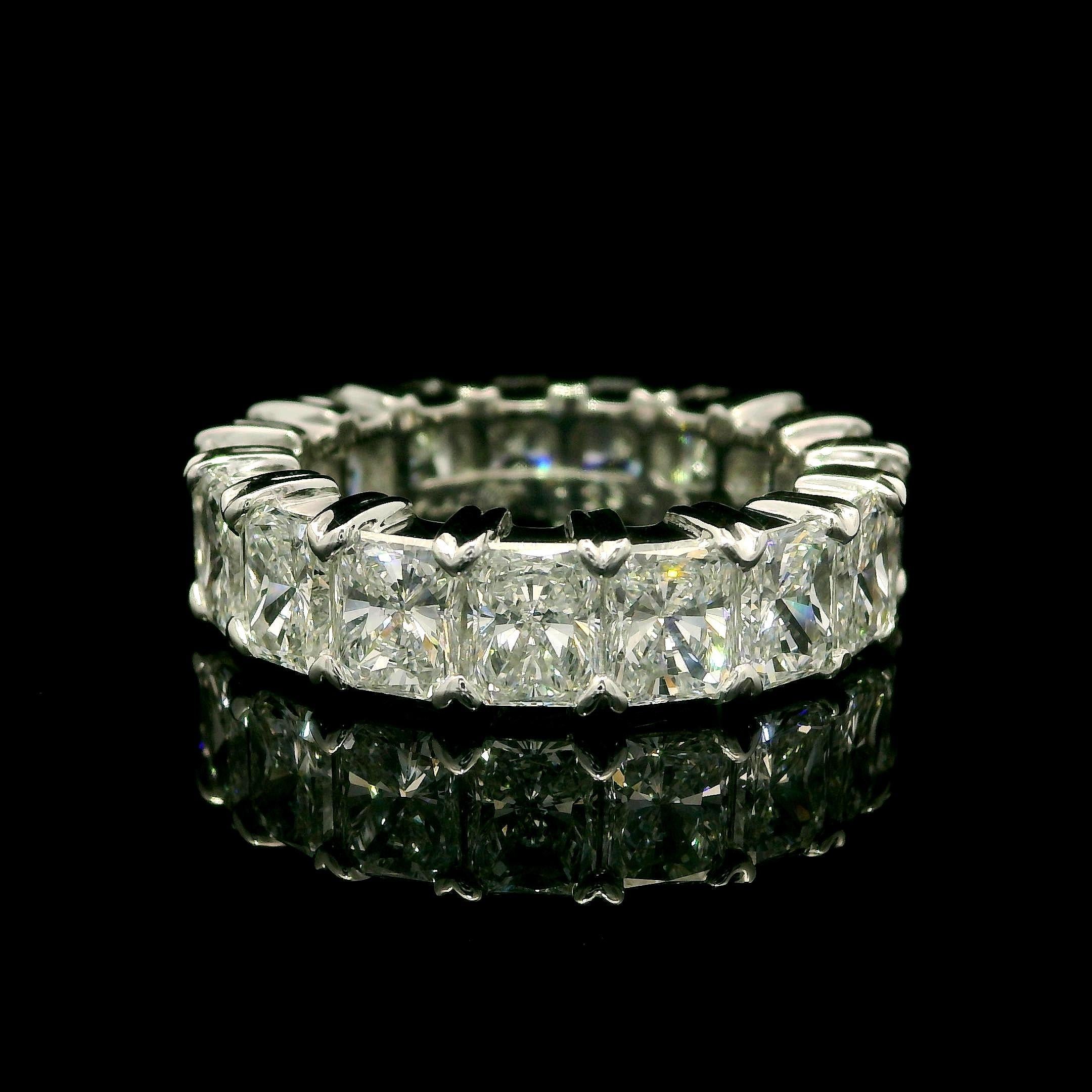 --Stone(s):--
(17) Natural Genuine Diamonds - Radiant Cut - Shared Prong Set - E/F Color - VVS-VS Clarity
Total Carat Weight: 6.12 (approx.)

Material: Solid .900+ Platinum
Weight: 8.71 Grams
Ring Size: 5.0 (Fitted on a finger. We can NOT custom