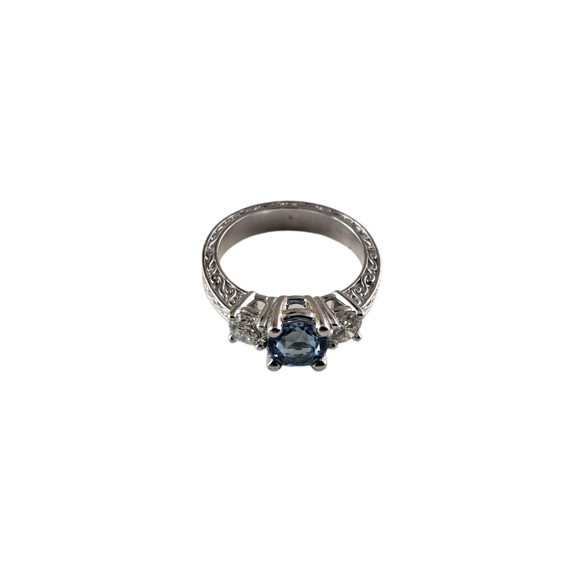 Vintage Platinum Topaz and Diamond Ring Size 5.5 JAGi Certified-

This lovely ring features one round blue topaz (6 mm) and two round brilliant cut diamonds set in classic platinum. Shank: 3.5 mm.

Topaz weight: 1.03 ct.

Total diamond weight: .48