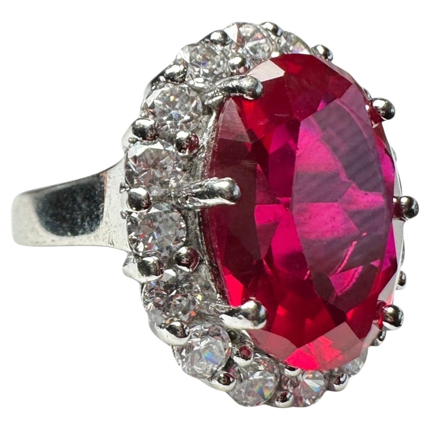 Platinum Travel Ring with 5 Carat Red Stone and 2.00 Carat Halo For Sale