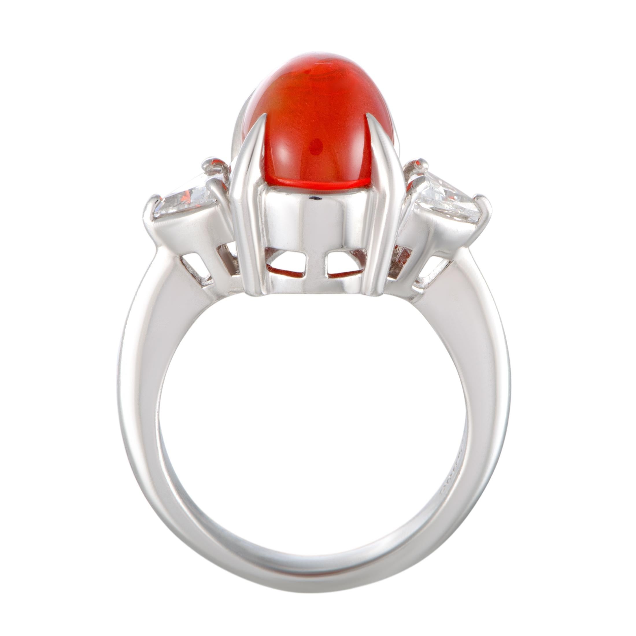 The captivating fire opal is the star of the show in this superb ring that is expertly crafted from gleaming platinum and also embellished with scintillating diamond stones. The diamonds amount to 0.43 carats and the opal weighs 3.95 carats.
Ring