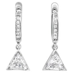 Orecchini in platino con diamante Trillion