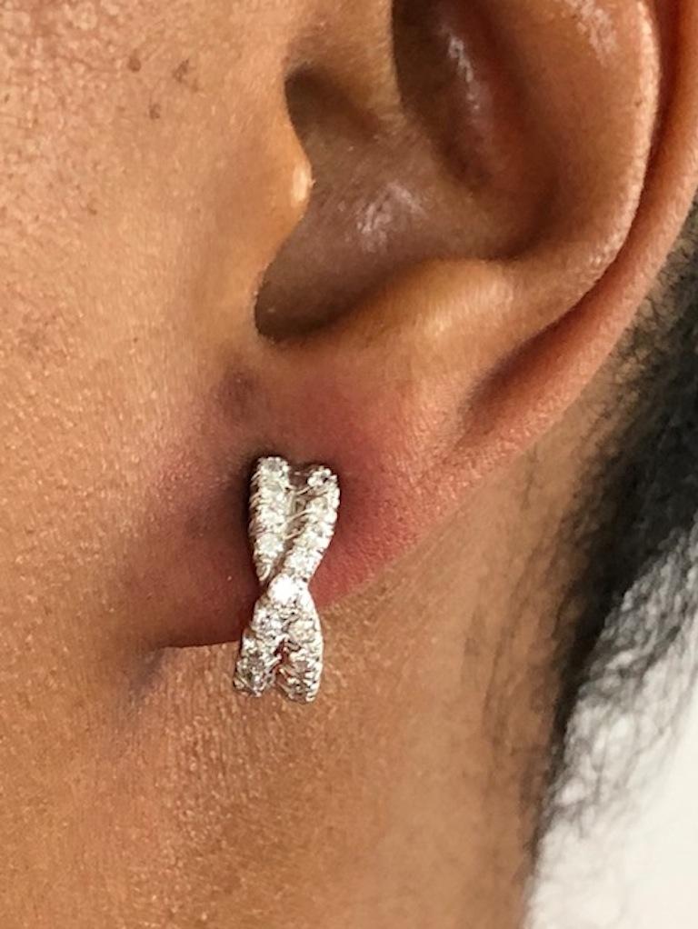These great Hoop earrings  have the perfect shape and fit on the ear, made in Platinum set with 42 round Diamonds 0.80 carats.
Hoop length is 3/4