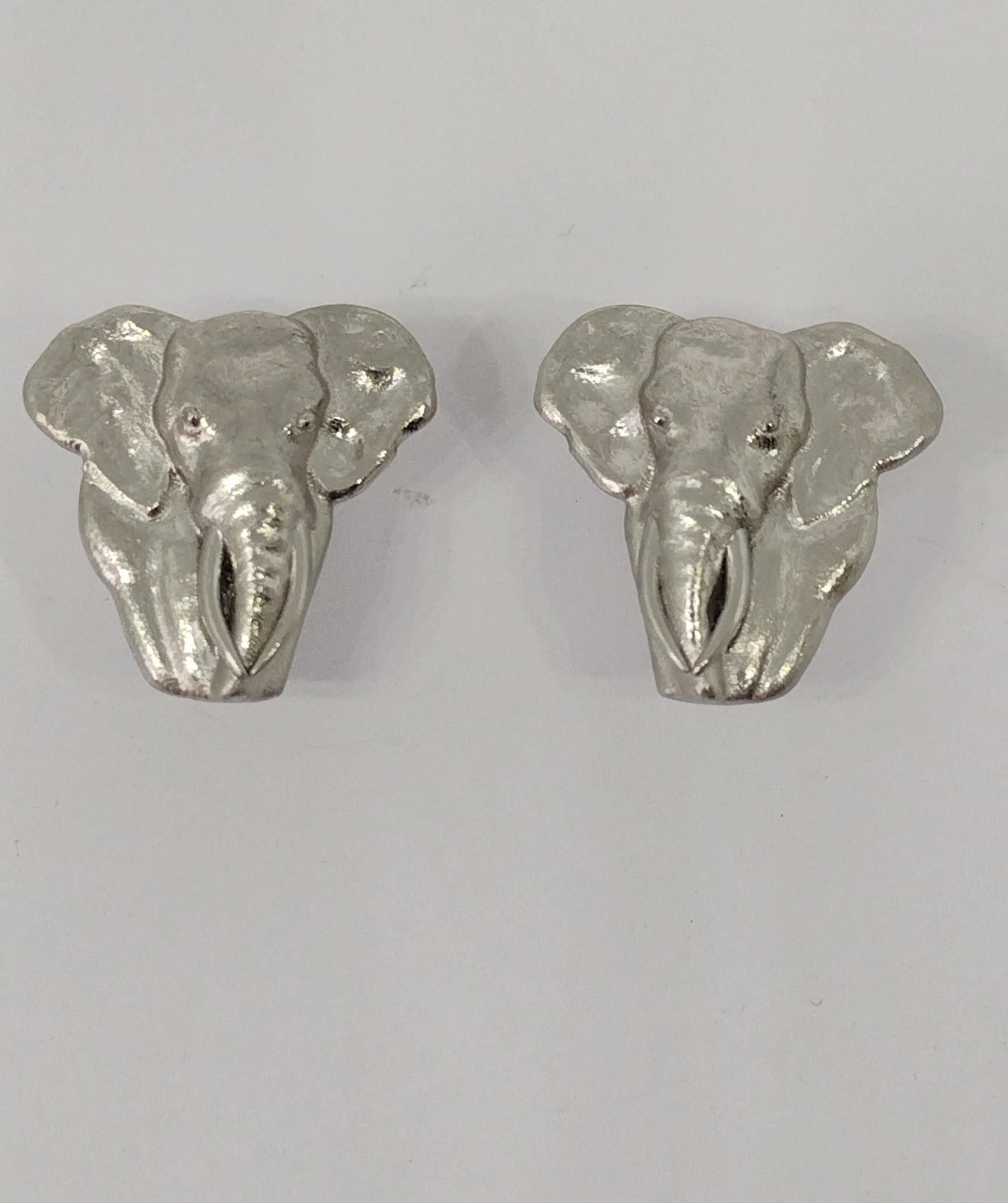 Platinum  Elephant Cufflinks  Now it's true. No more imaginary pink elephants. Skip the pink, There can be  White  2 elephants in the room!  Can you imagine riding an elephant?  Have the only elephants stomping through the concrete jungle of NYC or