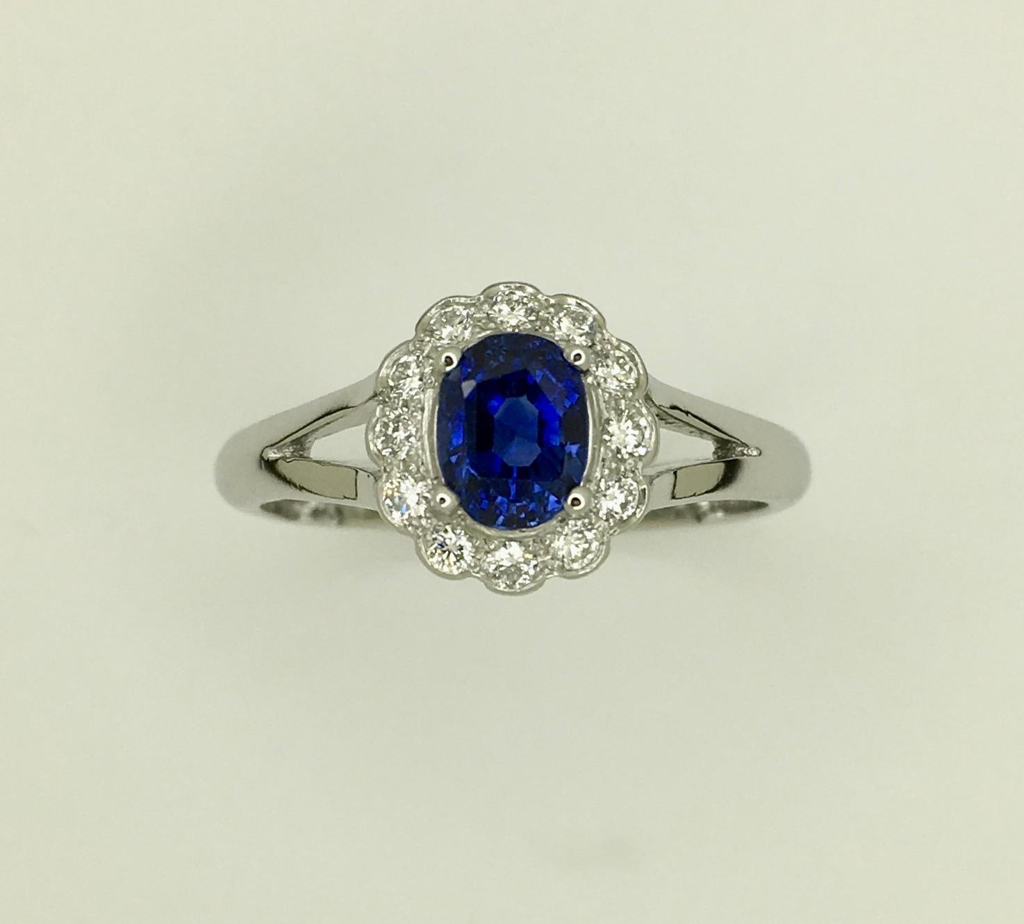 Oval Cut Platinum Untreated Ceylon Sapphire Diamond Cluster Ring For Sale