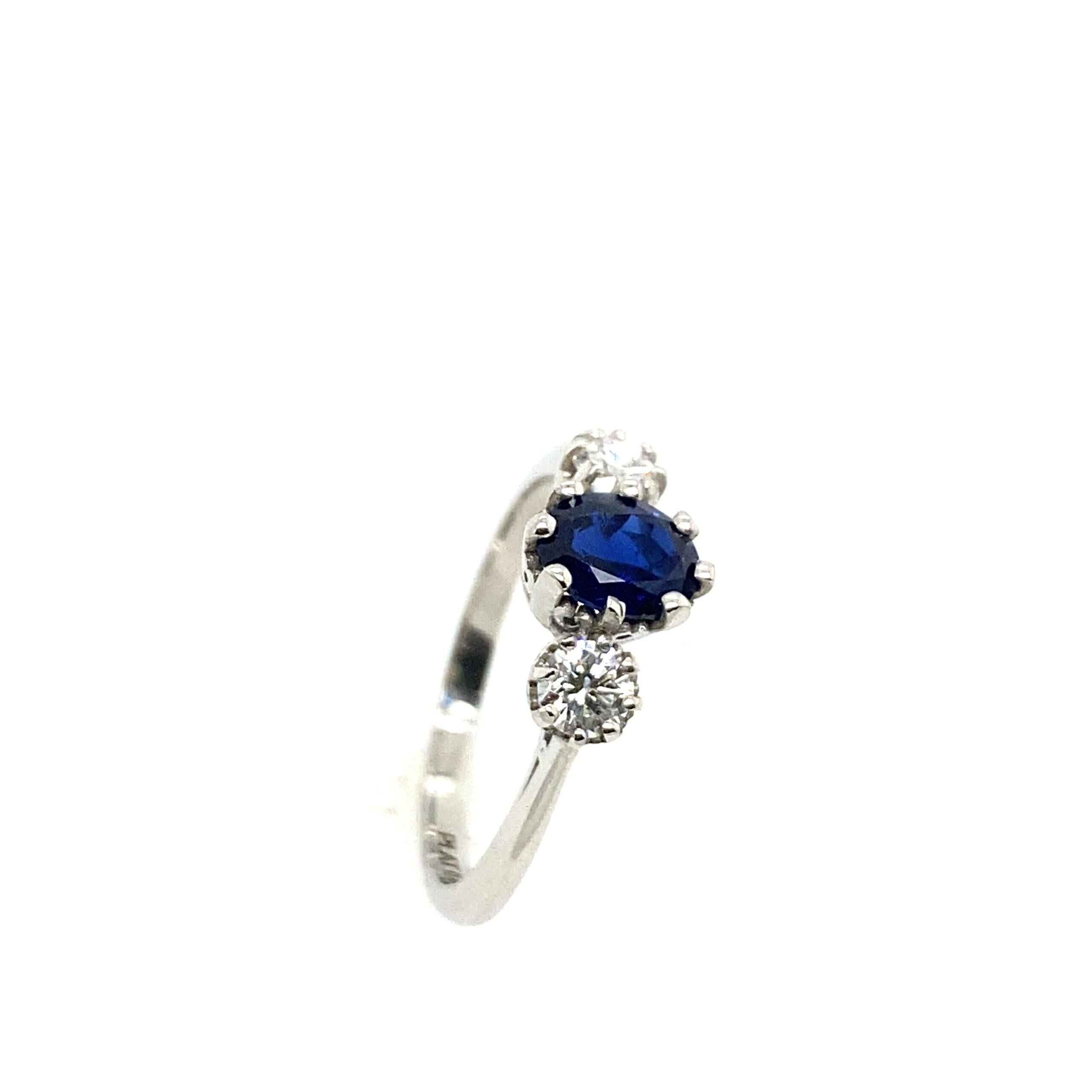 Round Cut Platinum Very Finest Blue 0.81ct Sapphire 3 Stone Ring with 0.37ct of Diamonds For Sale