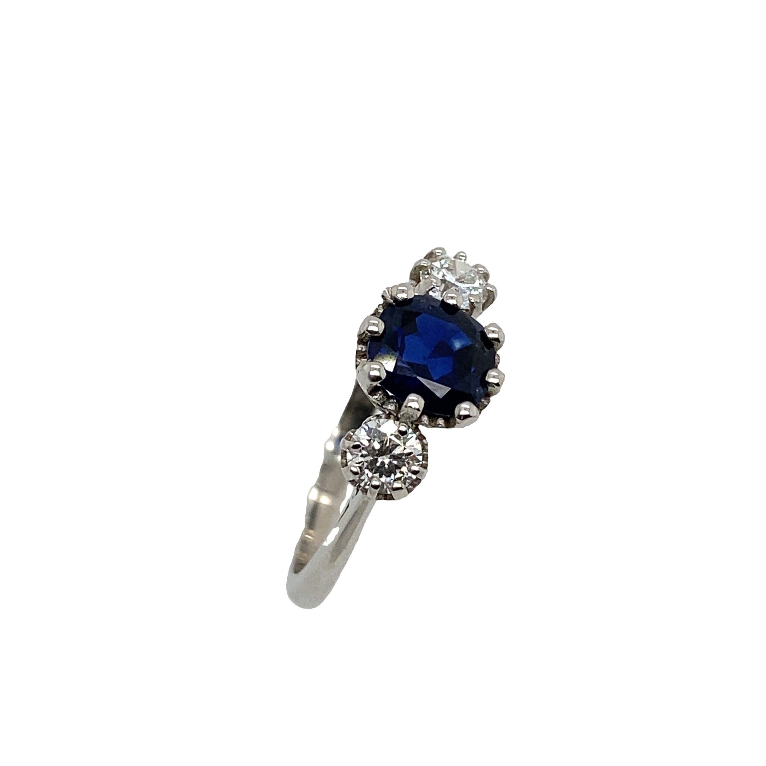 Platinum 3 Stone Very Finest Blue 1.06ct Sapphire Ring with 0.39ct of Diamonds

Additional Information:
Sapphire is from Thailand
Total Diamond Weight: 0.39ct
Diamond Colour: G
Diamond Clarity: VS
Total Weight: 3.9g Ring Size: M 1/2