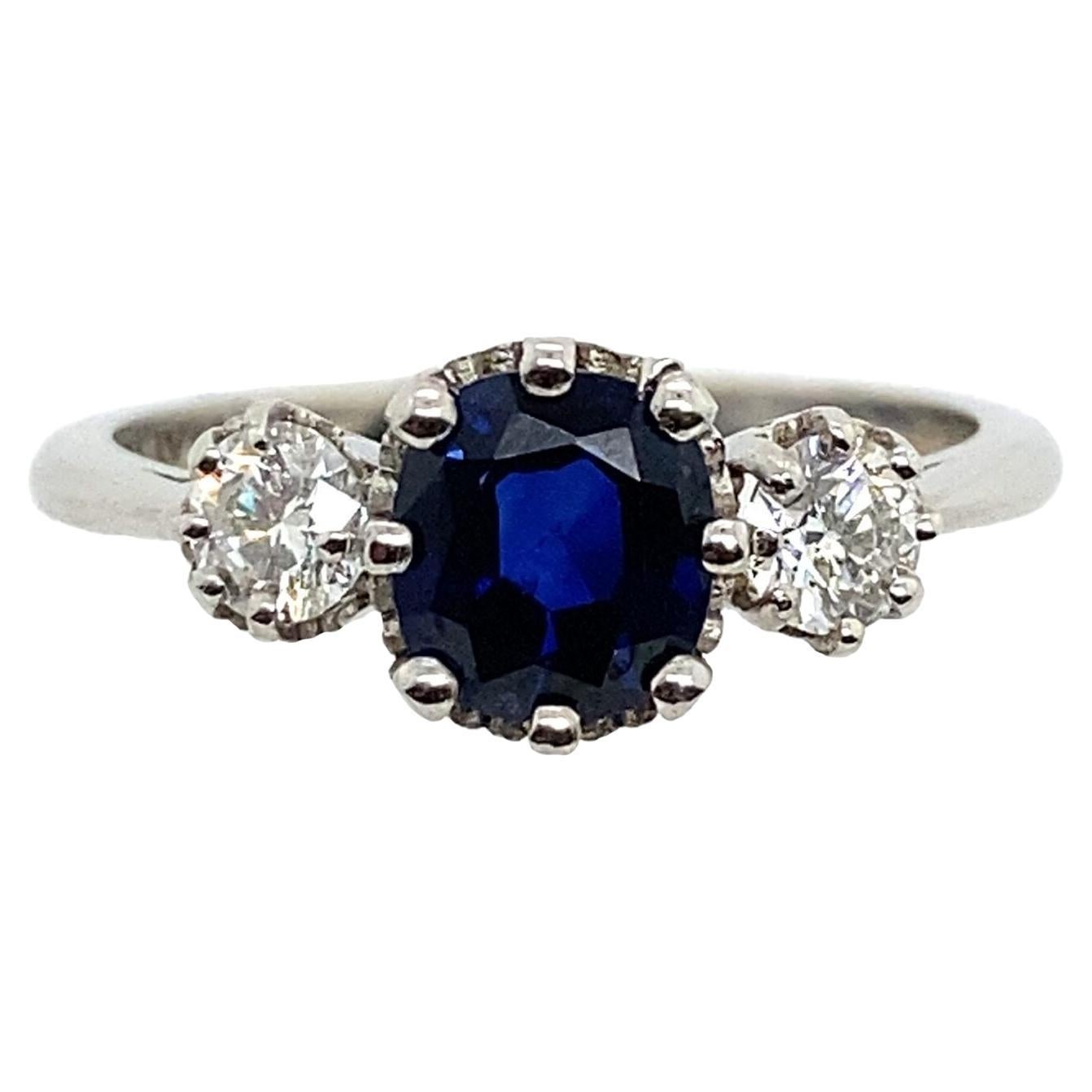Platinum Very Finest Blue 1.06ct Sapphire 3 Stone Ring with 0.39ct of Diamonds For Sale