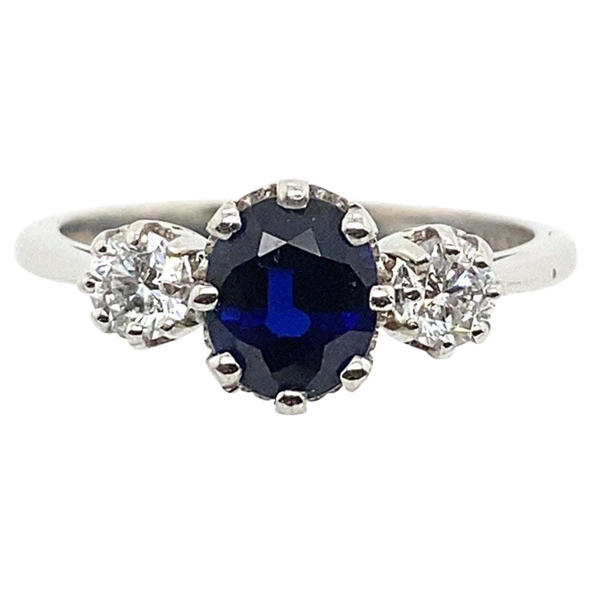 Anillo de platino con 3 piedras de zafiro azul de 1,19 ct y 0,39 ct de diamantes
