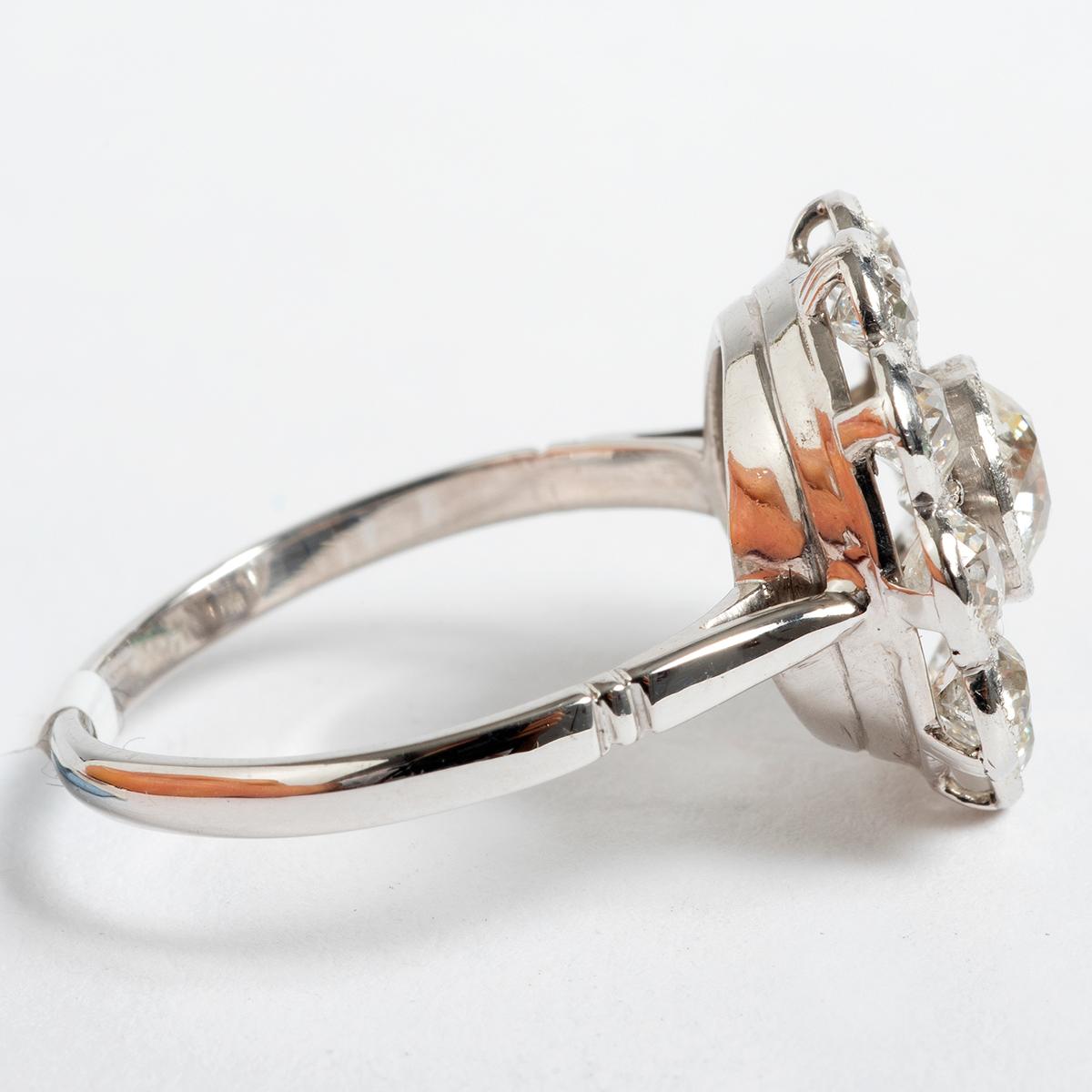 This stunning platinum victorian cut diamond cluster ring (13mm), is petal shaped and extremely elegant. Weight, est 2.00ct, clarity and colour, i/j si2. This ring would make an ideal gift for her... This ring comes in UK size L 1/2 and US size