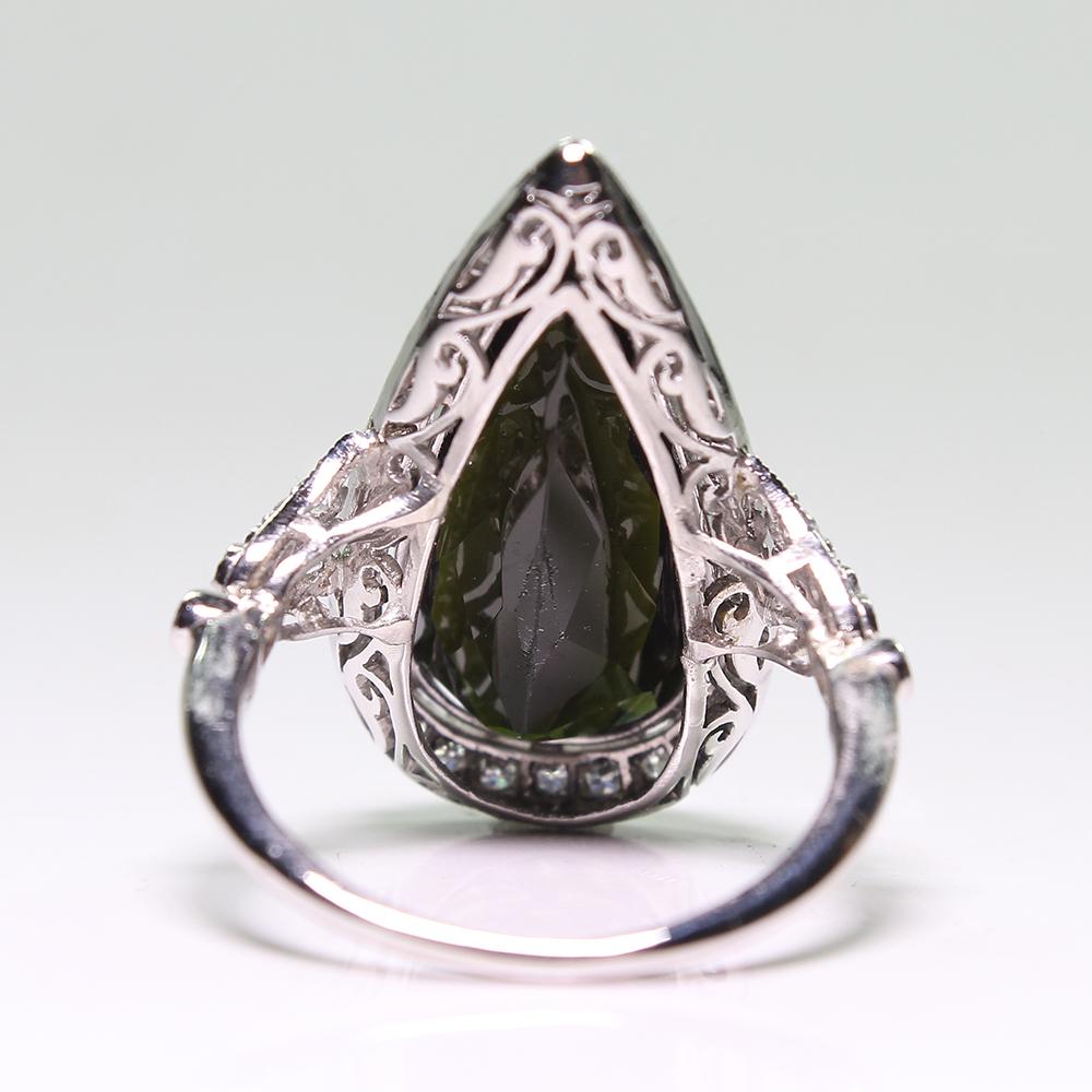 Women's Platinum Victorian Style Antique Green Tourmaline and Diamond Halo Ring For Sale