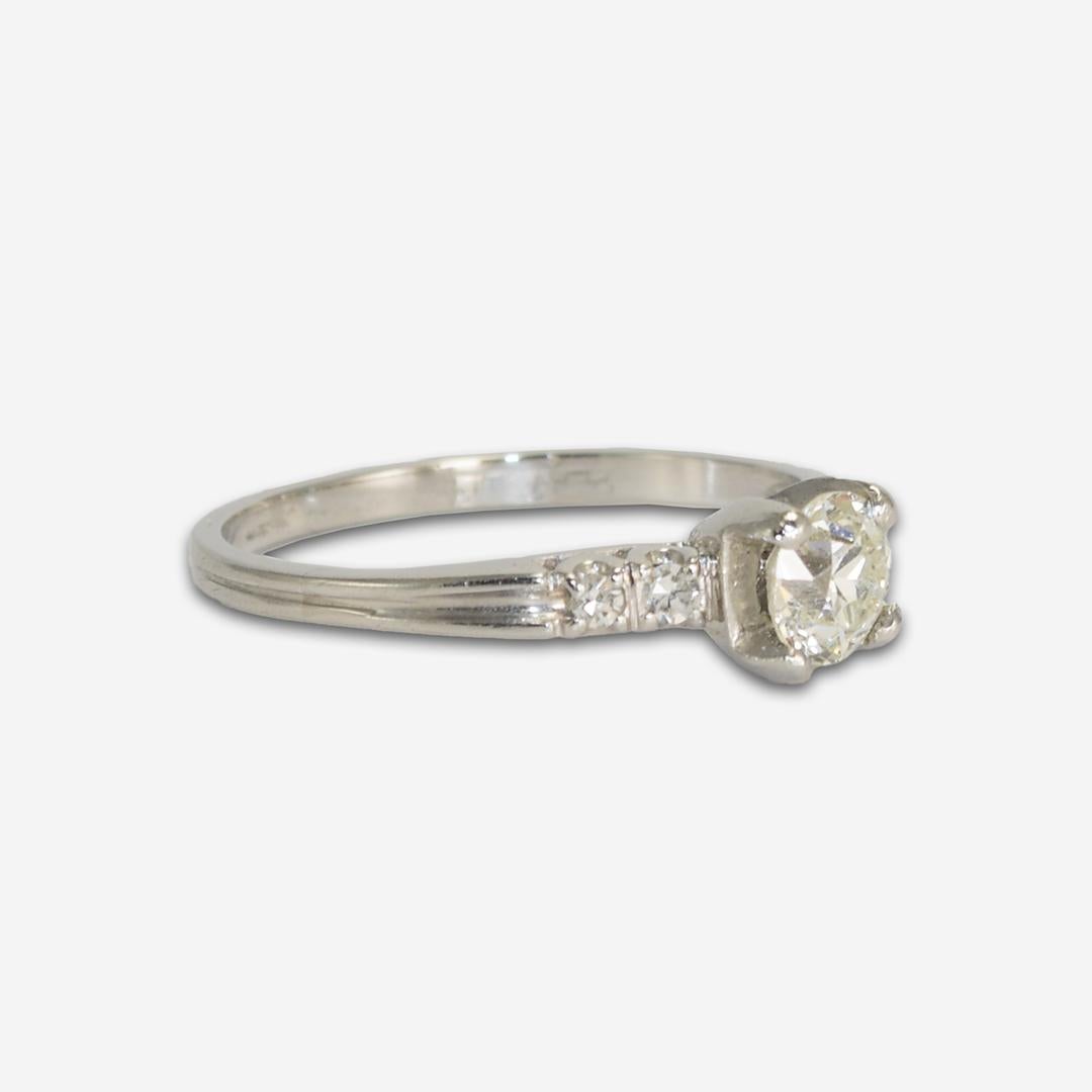 Vintage platinum and diamond ring.
Marked Platinum and weighs 3.7 grams.
The center diamond is an old-european cut, .63 carats, j to k color, vs clarity.
The old euro cuts are round with 58 facets like a modern brilliant, but they have shorter and