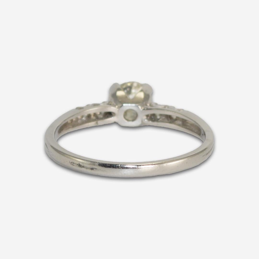 Platinum Vintage Accented Diamond Solitaire Engagement Ring 0.69ct In Excellent Condition For Sale In Laguna Beach, CA