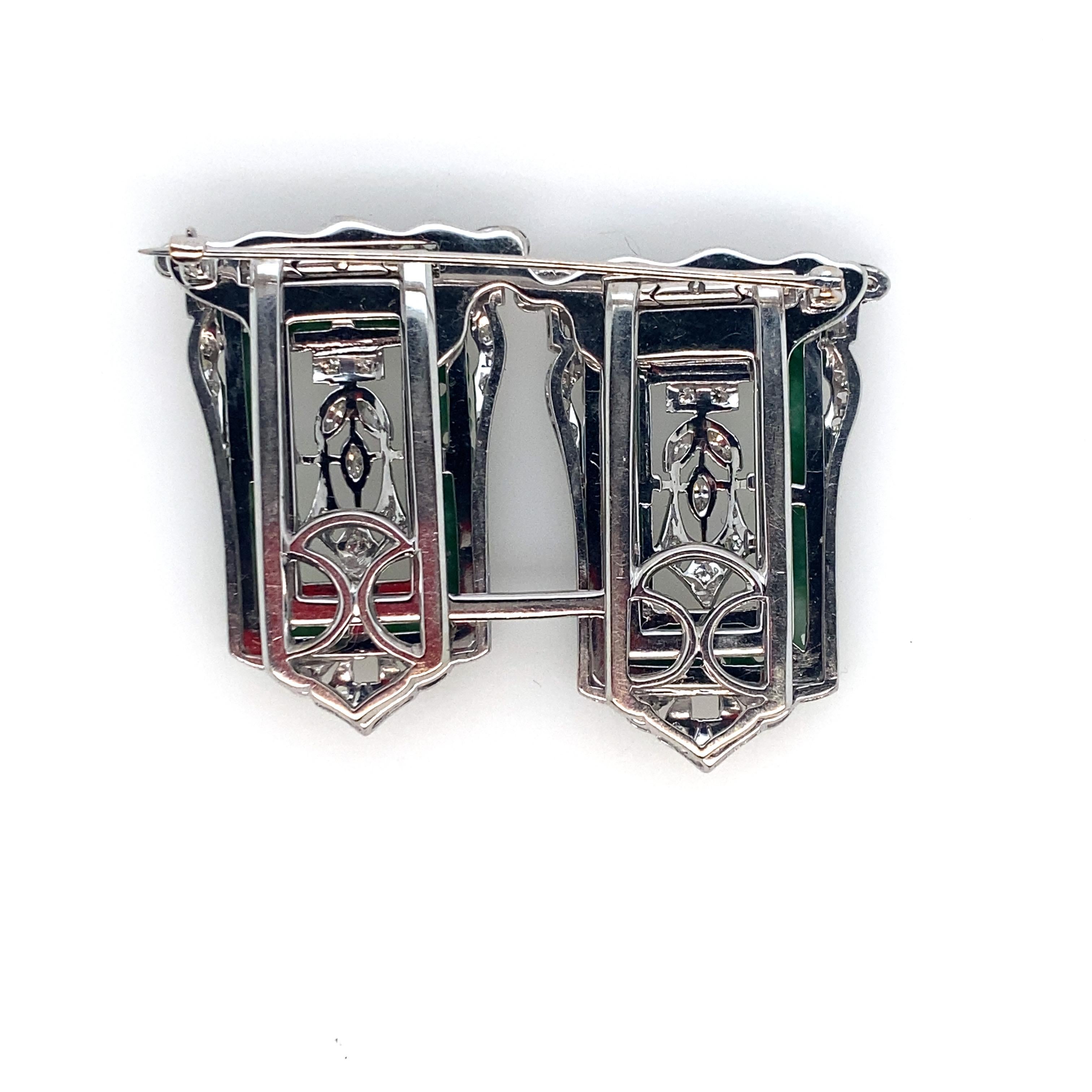 Platinum Vintage Art Deco Diamond and Jade Duette Brooch.  Circa 1940's.  From the Estate of New York CPA, Alfred W. Miles.  He was chairman of the Hoving Corporation, on the board of Tiffany's and Bonwit Teller Specialty stores.  This beaultiful
