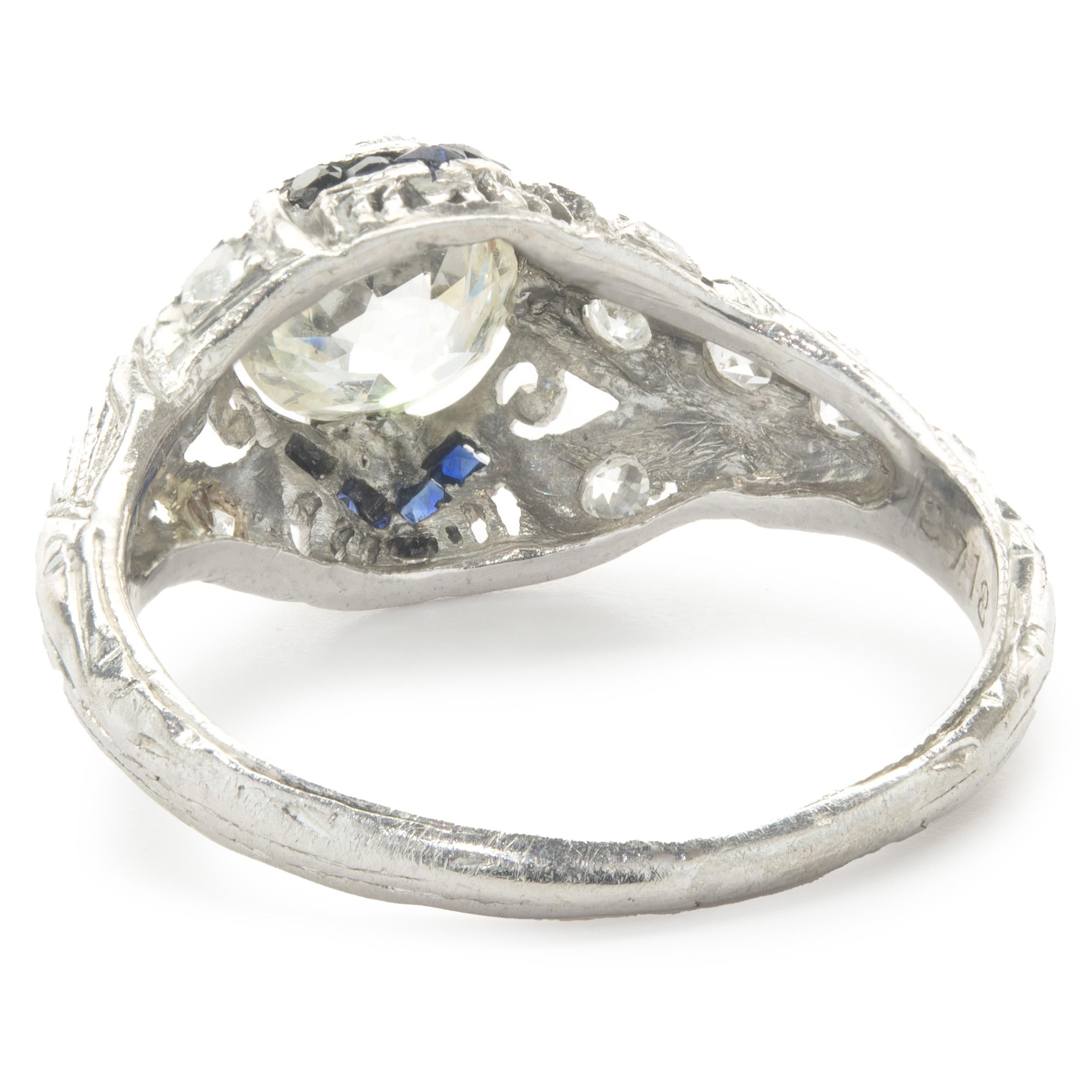 Round Cut Platinum Vintage Art Deco Diamond and Sapphire Ring For Sale