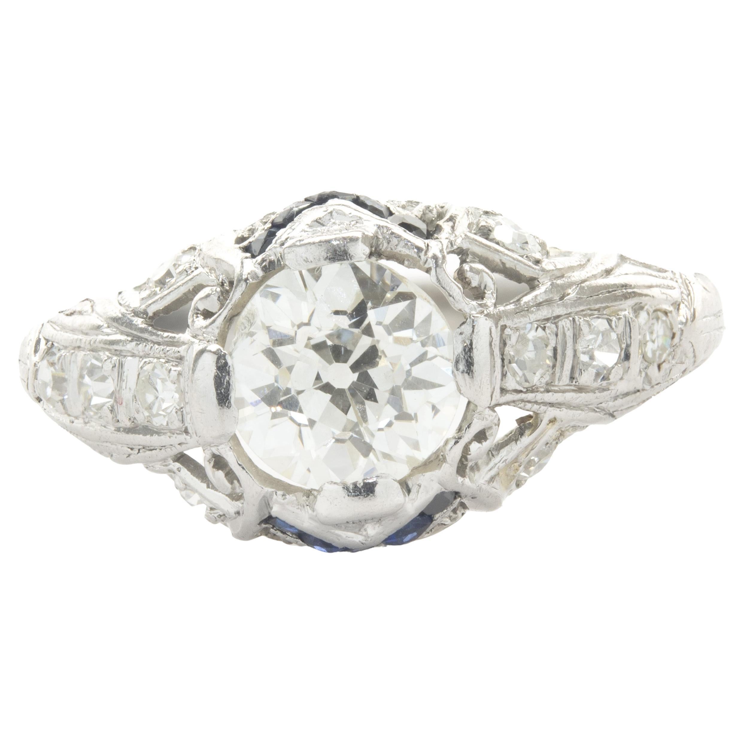 Platinum Vintage Art Deco Diamond and Sapphire Ring For Sale