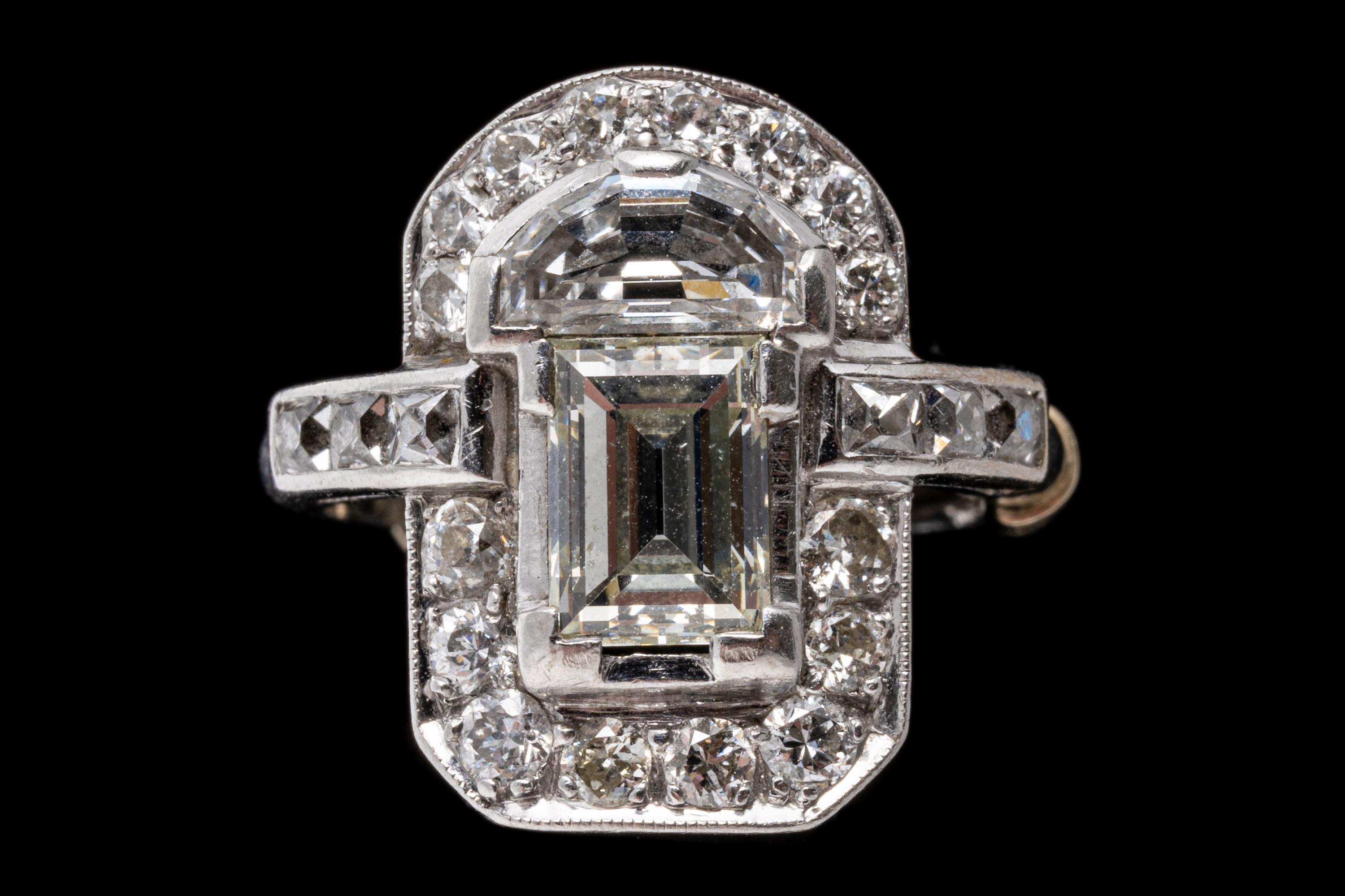 Women's Platinum Vintage Art Deco Style Emerald Cut Diamond Ring For Sale