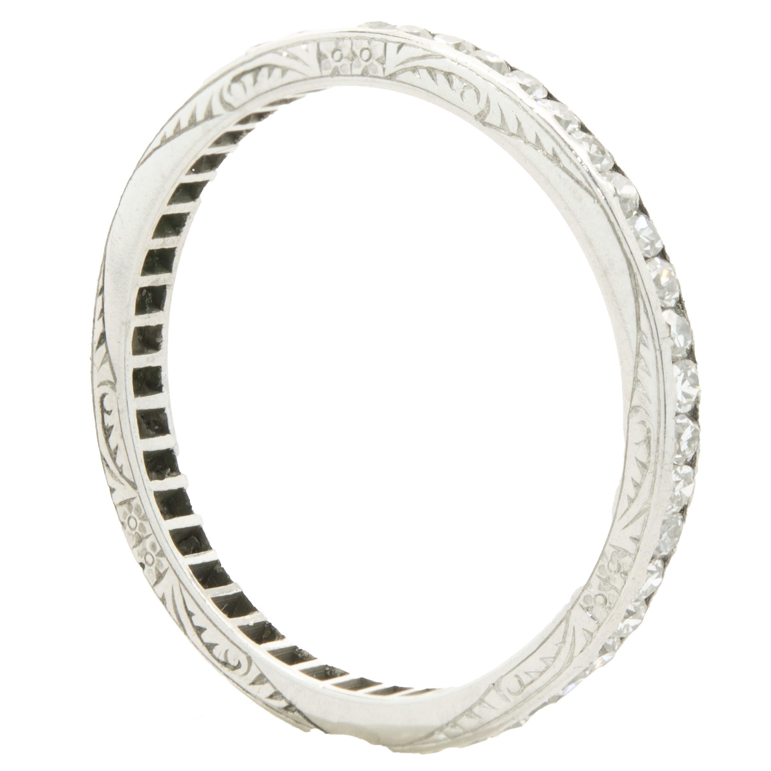 Designer: Custom
Material: platinum
Diamonds: 43 round brilliant cut = 0.43cttw
Color: H
Clarity: SI2
Size: 6
Dimensions: ring measures 2mm in width
Weight: 1.91 grams