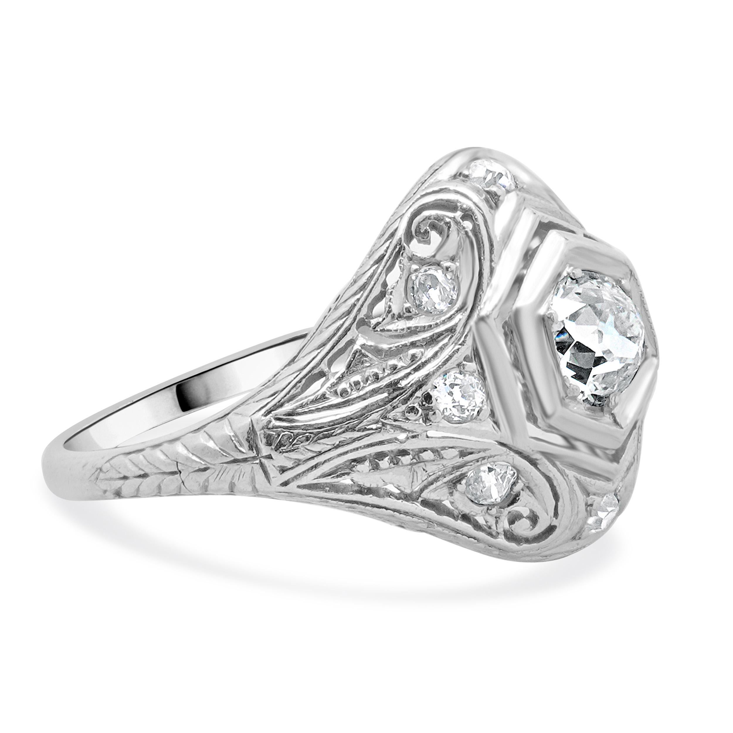 Designer: custom
Material: platinum
Center Diamond: 1 euro cut = 0.50ct
Color : F
Clarity : VS2 
Diamond: 8 old mine cut = 0.24cttw
Color: F
Clarity: SI1
Size: 6.75 (please allow up to 2 additional business days for sizing requests)
Weight: 4.13
