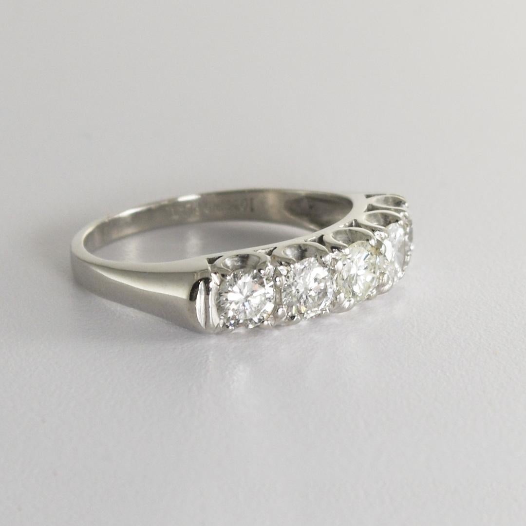 Vintage platinum and diamond ring.
Stamped 10% Irid Plat and weighs 5.2 grams gross weight.
Tests 87.5% platinum and 10% iridium using an XRF metals analyzer.
The diamonds are round brilliant cuts, 1.20 total carats, G to H color, and Si