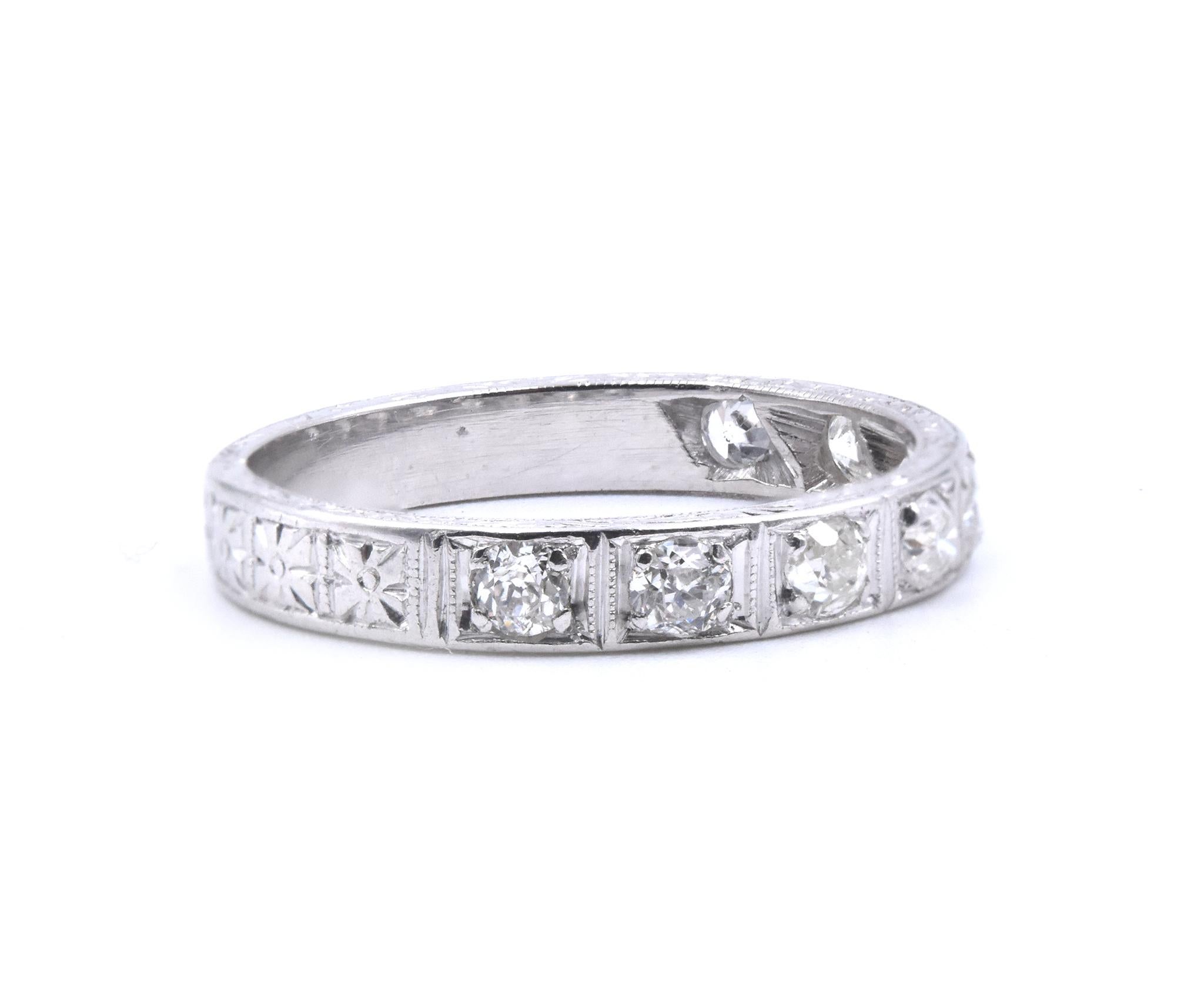 Material: Platinum 
Diamonds: 8 round brilliant cut = 0.50cttw
Color: G
Clarity: SI1
Ring Size: 7 (please allow up to 2 additional business days for sizing requests)
Dimensions: ring measures 3.25mm wide
Weight: 3.97 grams