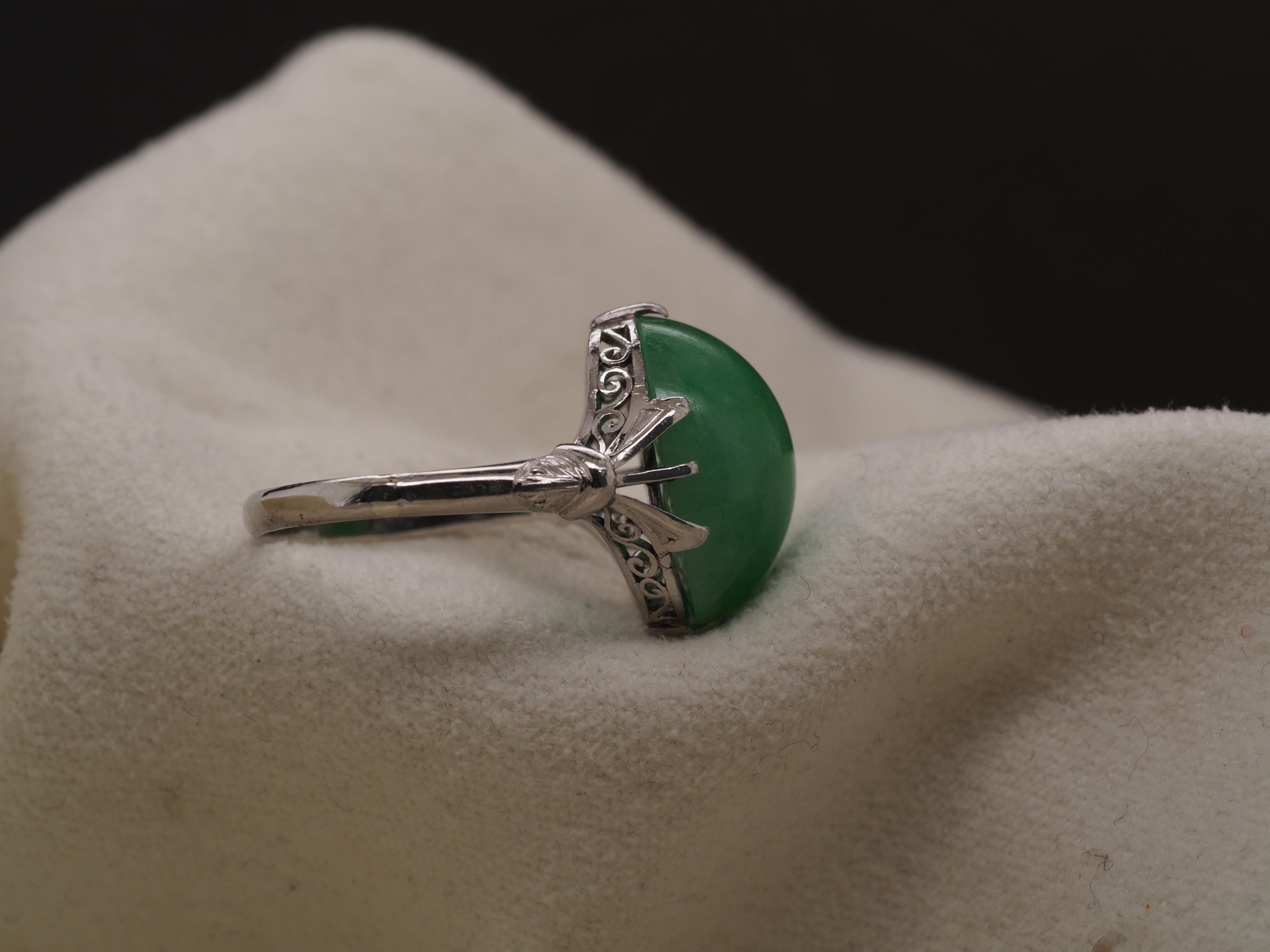 Item Details:
Ring Size: 6.75
Metal Type: Platinum [Hallmarked, and Tested]
Weight: 5 grams

Jade: 3ct, oval cabochon shape, green

Band Width: 2.1mm
Condition: Excellent

Price: $1500

This ring can be sized up or down 4 sizes for an additional