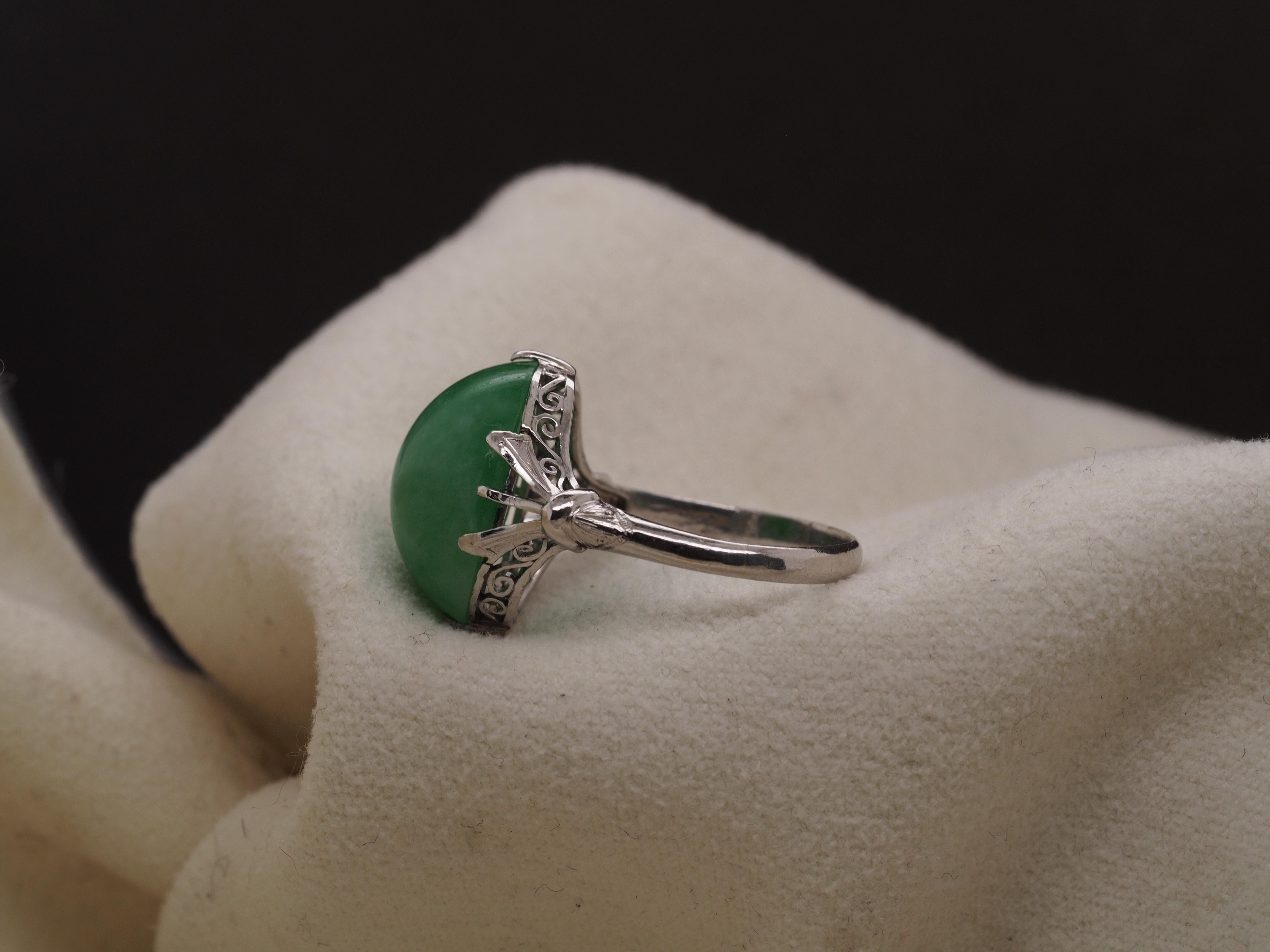 Oval Cut Platinum Vintage Jade Ring with Ornate Open Work For Sale