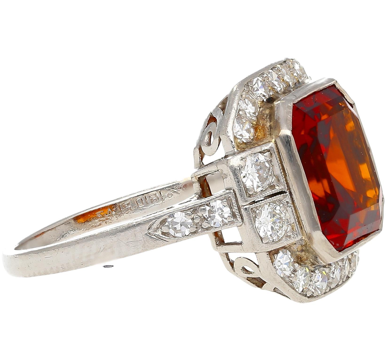 Platinum Vintage Reto 4.42 Carat Citrine Bezel & Diamond Halo Ring.

Jewelry Details:
Item Type: Vintage Platinum Ring
Metal Type: Platinum
Gemstones: Citrine, 24 round cut diamonds
Weight: 5.27 grams

Center Stone Details:
Gemstone Type: