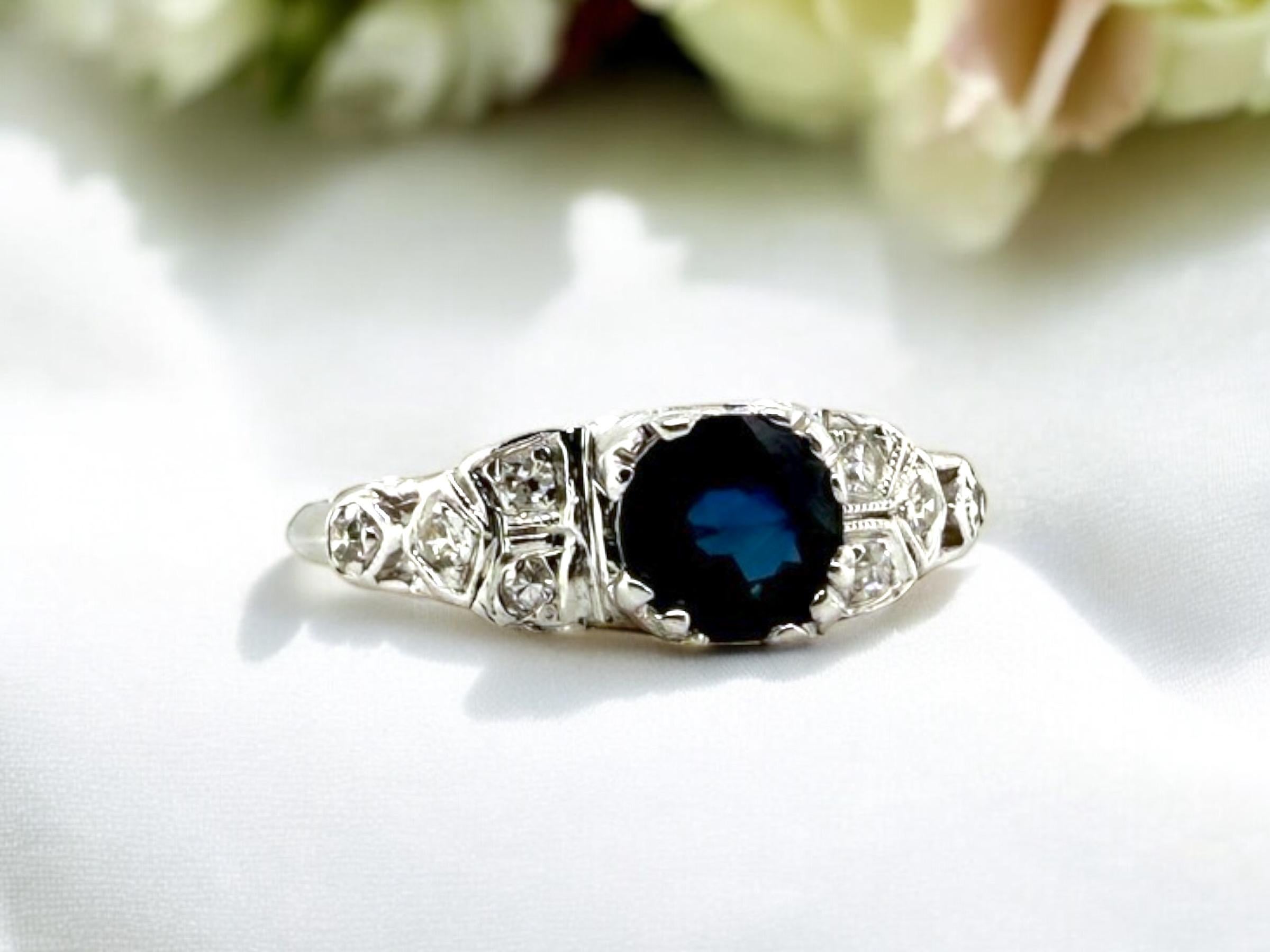 We are loving this dainty beauty!!
She would be a great dainty engagement ring or a beautiful right hand ring.

Ring Details
Material: Platinum
Era: Retro 1940 - 1970
Head Width: 5.2mm
Head Height: 4.8mm
Shank Width: Tapering to 1.5mm
Weight: 2.6