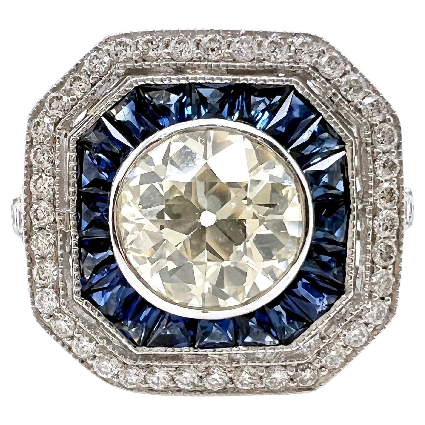 Platinum Vintage Style Old Mine Cut Diamond with Sapphire For Sale