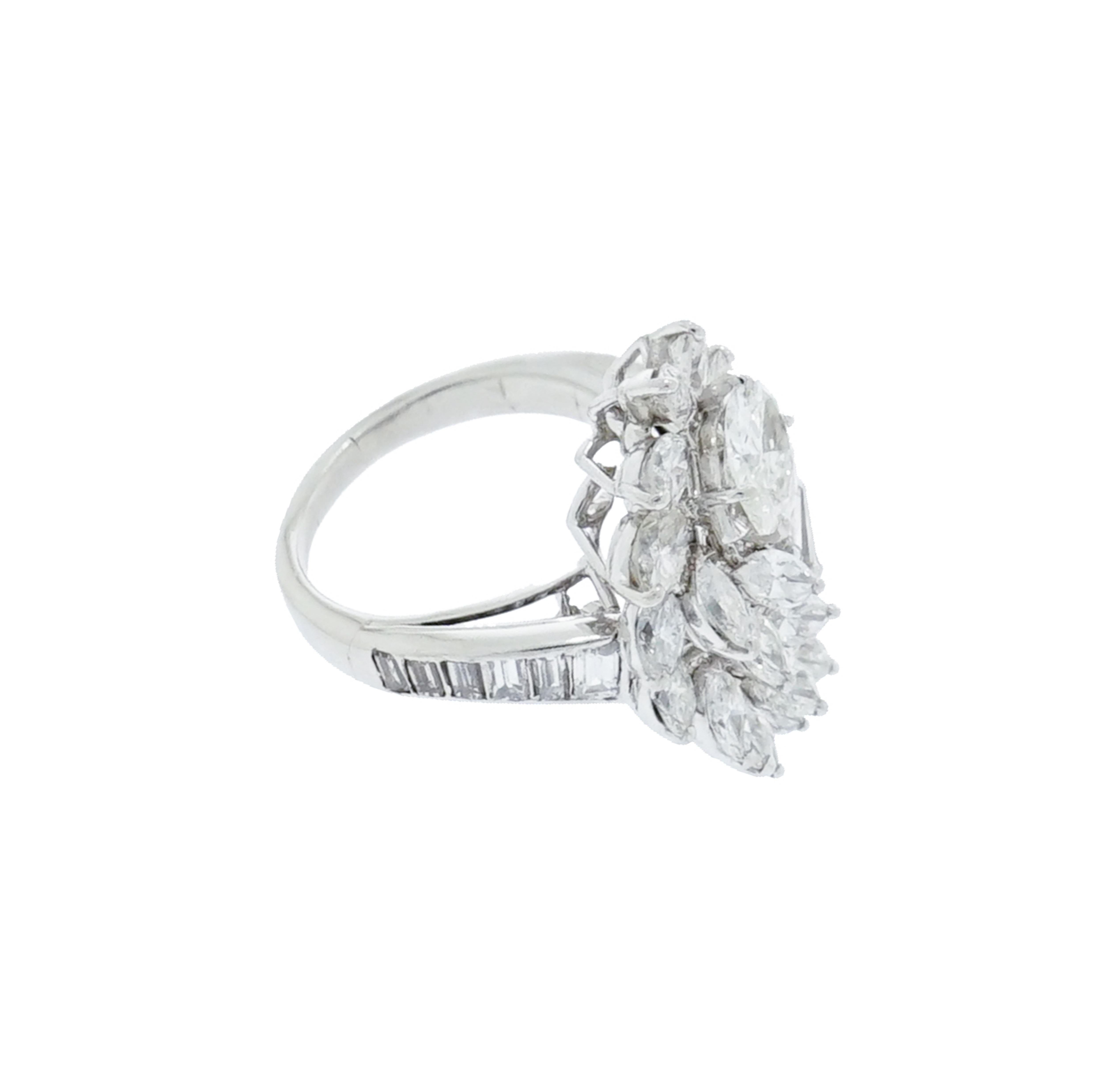 Vintage-inspired style, the antique look definitely isn't going anywhere, and from brooches to cocktail rings, this look is a slam dunk for parties, festive days and nights.
Handcrafted in Platinum featuring a 0.45 carat Marquise cut center and