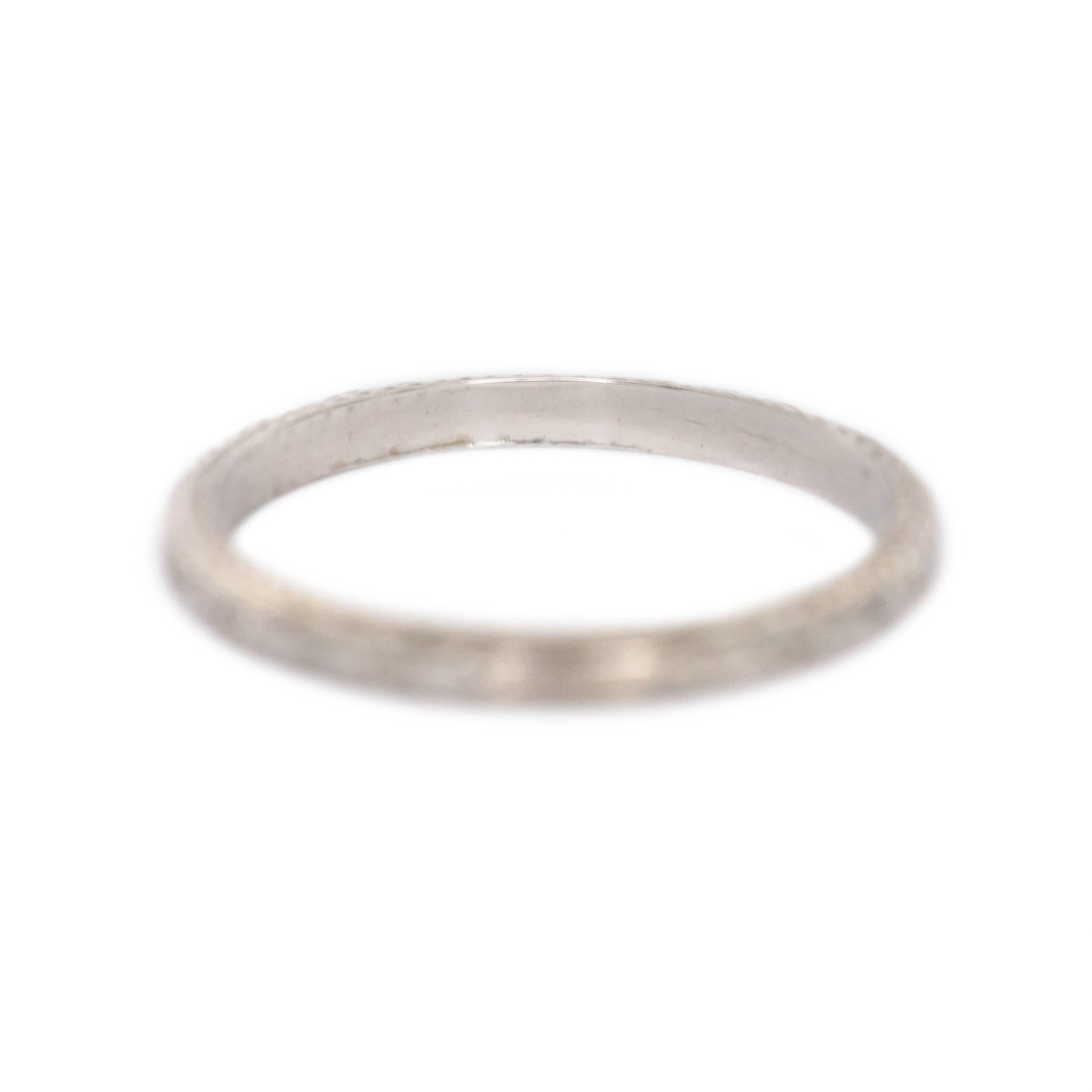 Item Details: 
Ring Size: Approximately 10.20
Metal Type: 18 Karat White Gold
Weight: 2.6 grams

Width of band: 2.32 mm

Finger to Top of Stone Measurement: 1.47 mm