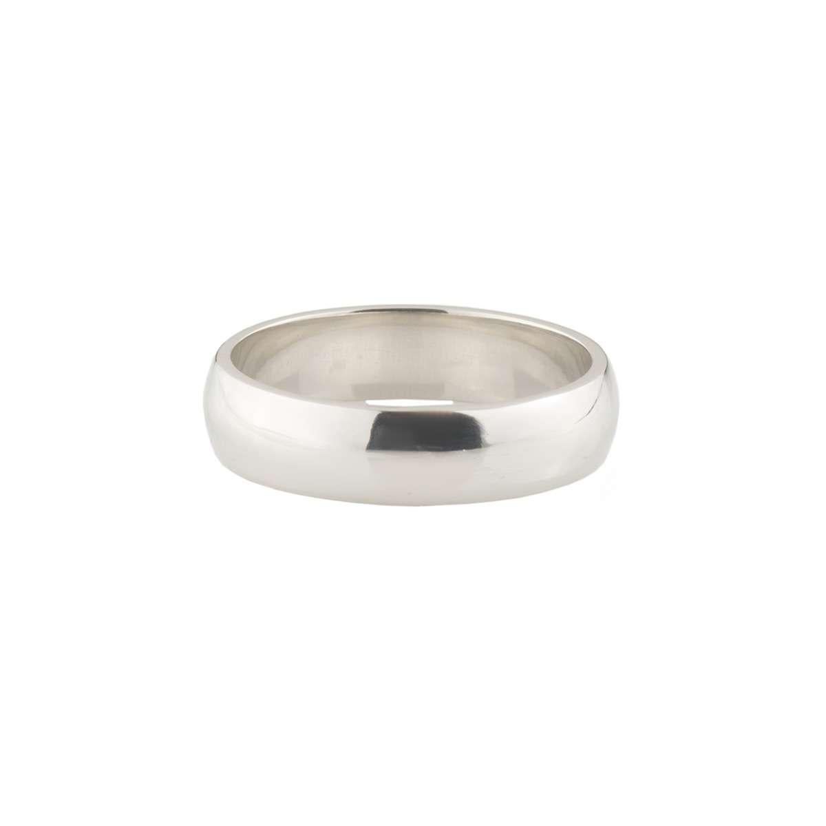 A classic wedding band in platinum. The band is 5mm in width and is a D-shape fit with a polished finish. The ring is currently a size UK Q - EU 57 but can be adjusted for a perfect fit and has a gross weight of 8.30 grams.

The ring comes complete
