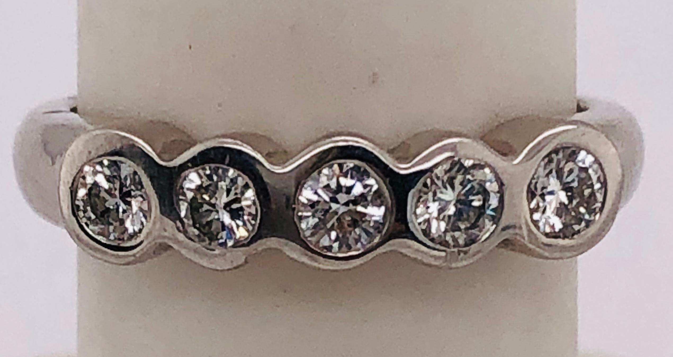 Platinum Wedding Band with Five Round Diamonds .50 Total Diamond Weight For Sale 1