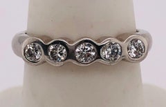 Platinum Wedding Band with Five Round Diamonds .50 Total Diamond Weight