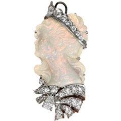 Platinum, White Opal, Carved Lady in Silhouette Pendant / Brooch with Diamonds