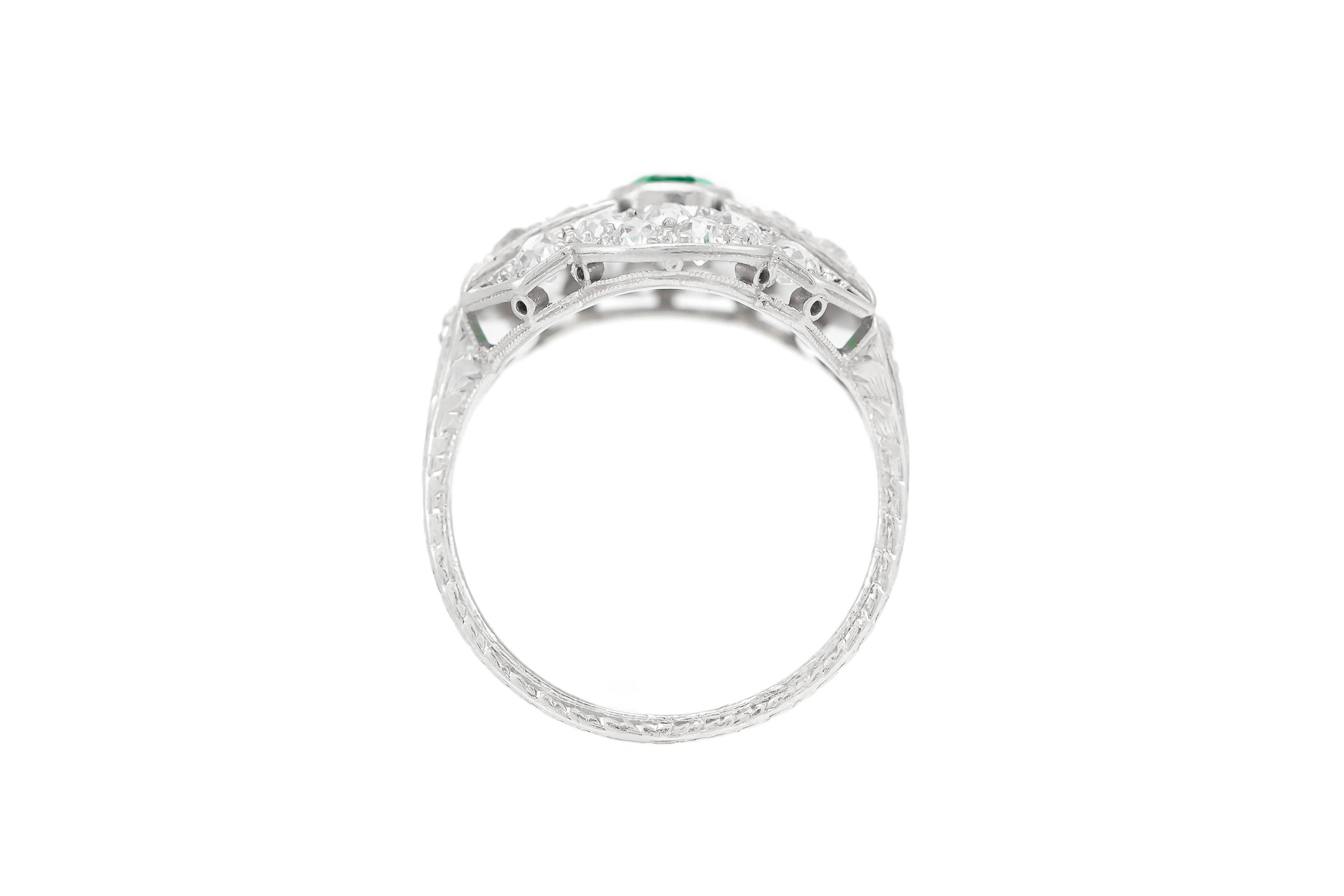 Platinum with Center Stone Emerald and Diamonds Ring In Excellent Condition For Sale In New York, NY