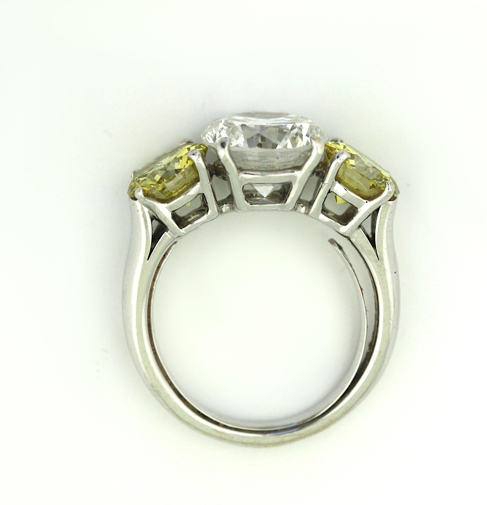 Platinum, Yellow Diamond and Diamond Three Stone Engagement Ring For Sale 1
