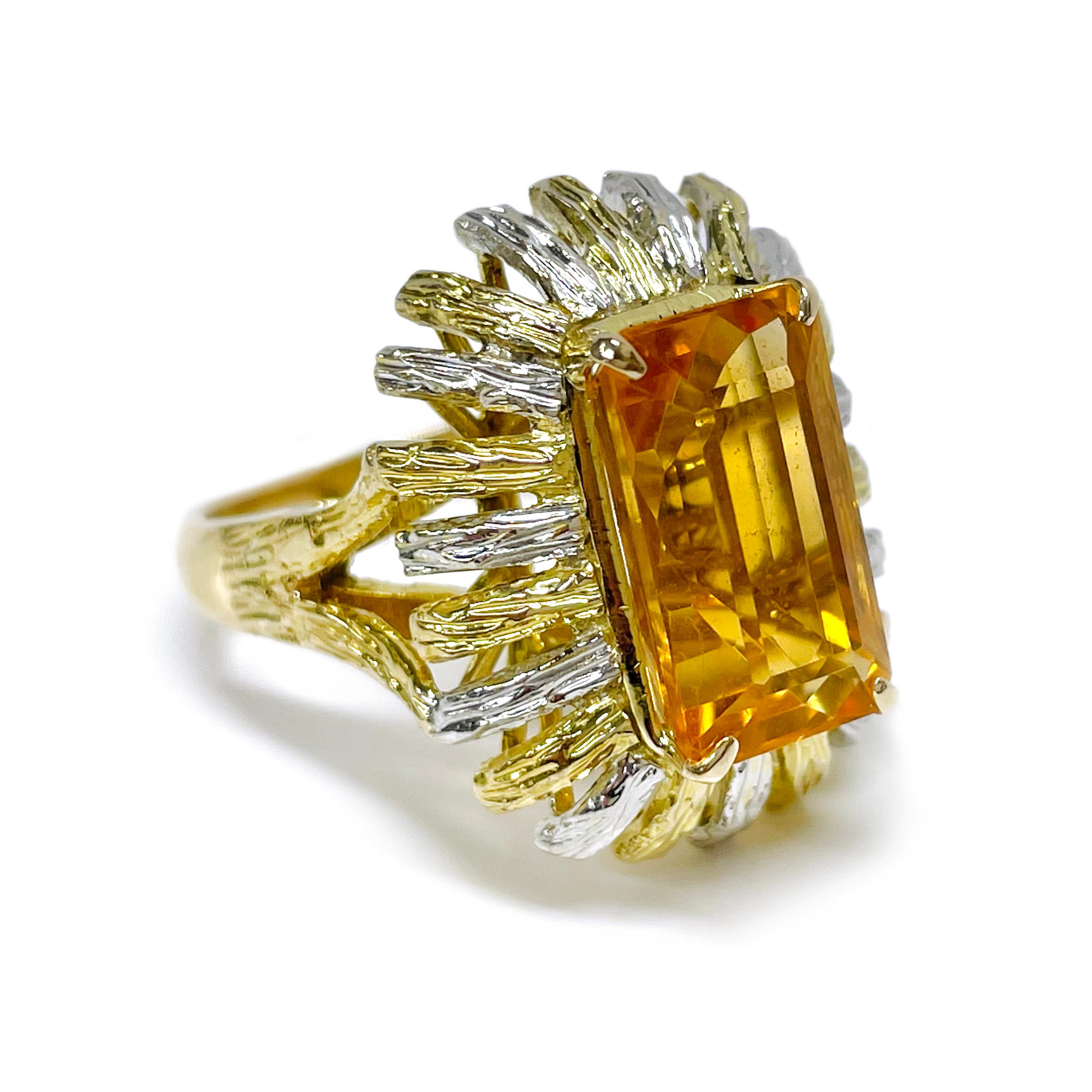 Platinum 18 Karat Yellow Gold Citrine Ring. The ring features a baguette-cut 13.3 x 7.7mm Citrine. The gemstone is four prong-set and the split band has a unique textured finish to about a quarter of the way down. That same texture is present on