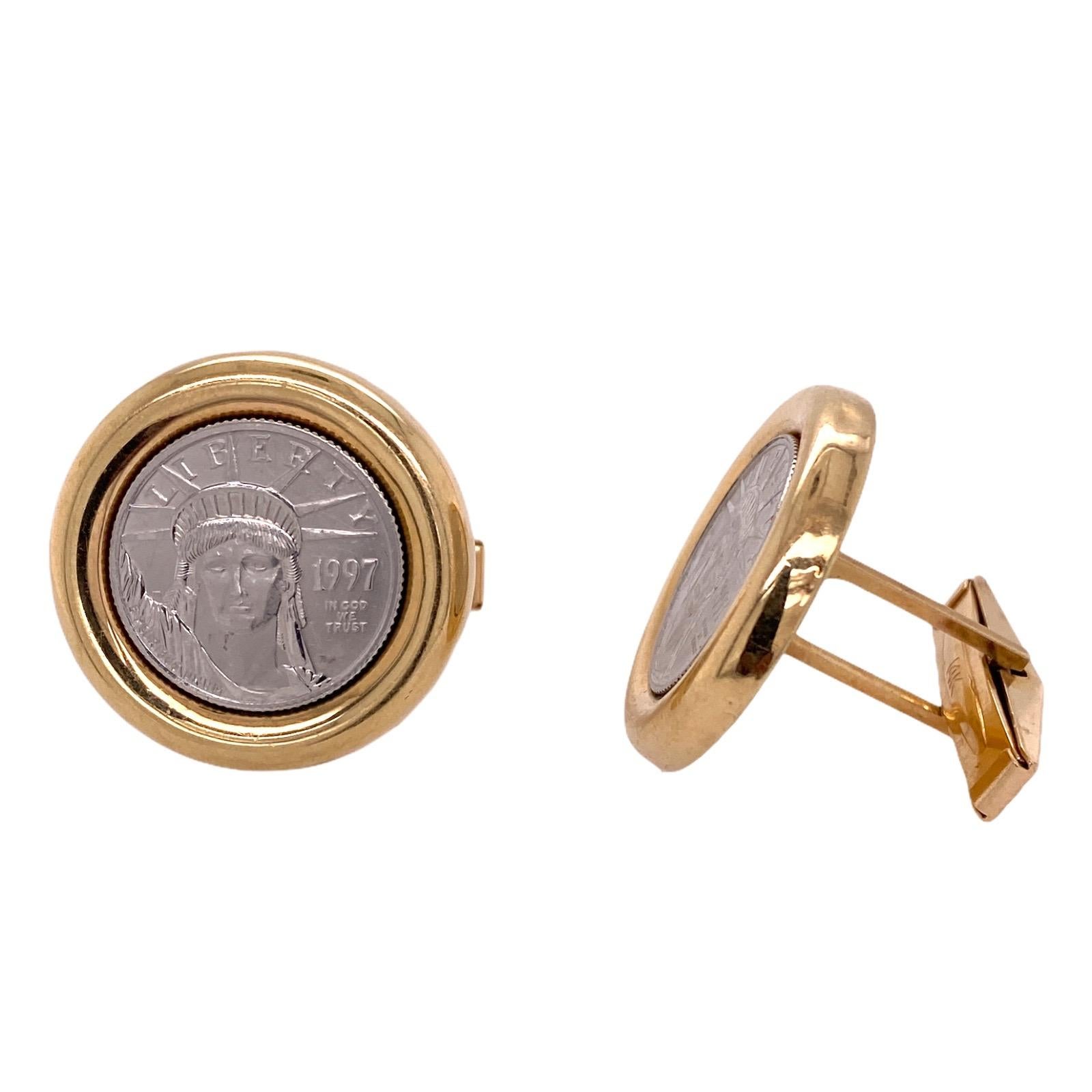 Platinum Liberty 1997 coin cufflinks set in 14 karat yellow gold. The vintage cufflinks measure 24mm in diameter. 