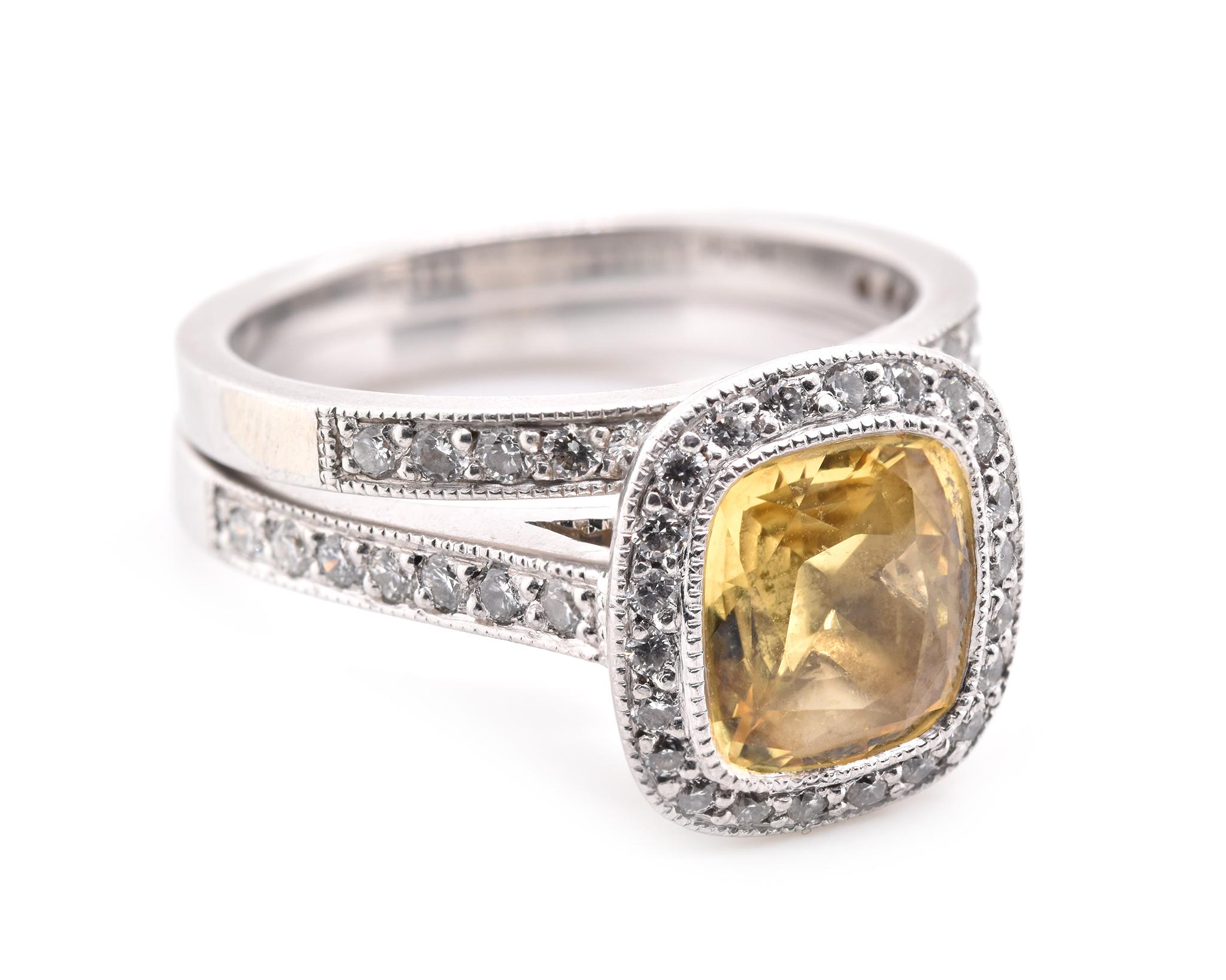 Designer: custom
Material: platinum
Sapphire: 1 yellow modified brilliant cushion cut sapphire = 2.79ct
GIA Certification: 2115869881
Diamonds: 67 round brilliant cuts = 1.25cttw
Color: F-G
Clarity: VS1-VS2
Ring size: 8 ½ (please allow two