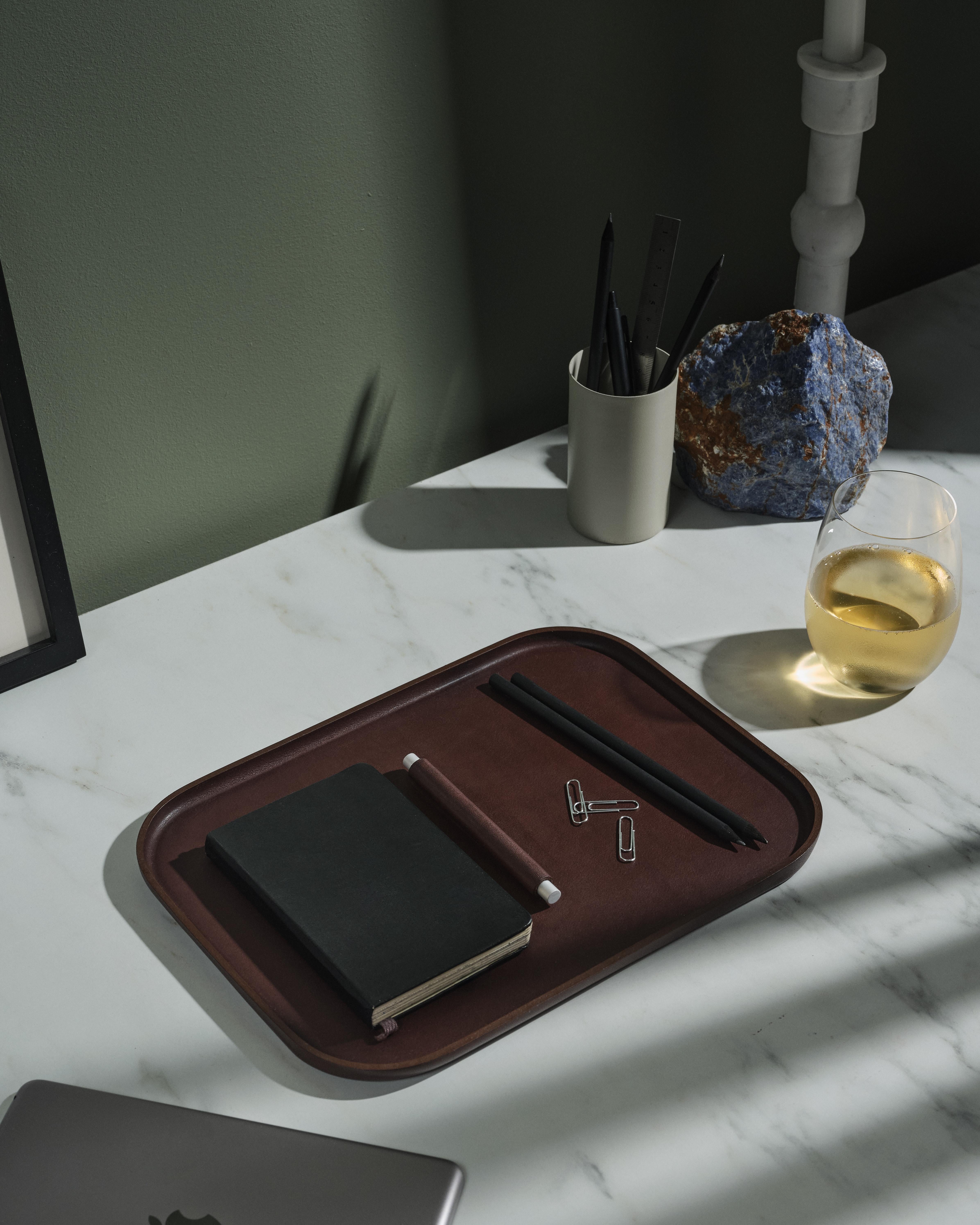 Plato Rectangle No.02 in Vegetable Tanned Leather & Anodized Aluminum by UNIQKA
Designed by Defne Koz
Dimensions: D 30 x W 45 x H 2,5 cm. 
Materials: Vegetable-tanned leather and anodized aluminum.

Available in dark brown, beige, and green leather