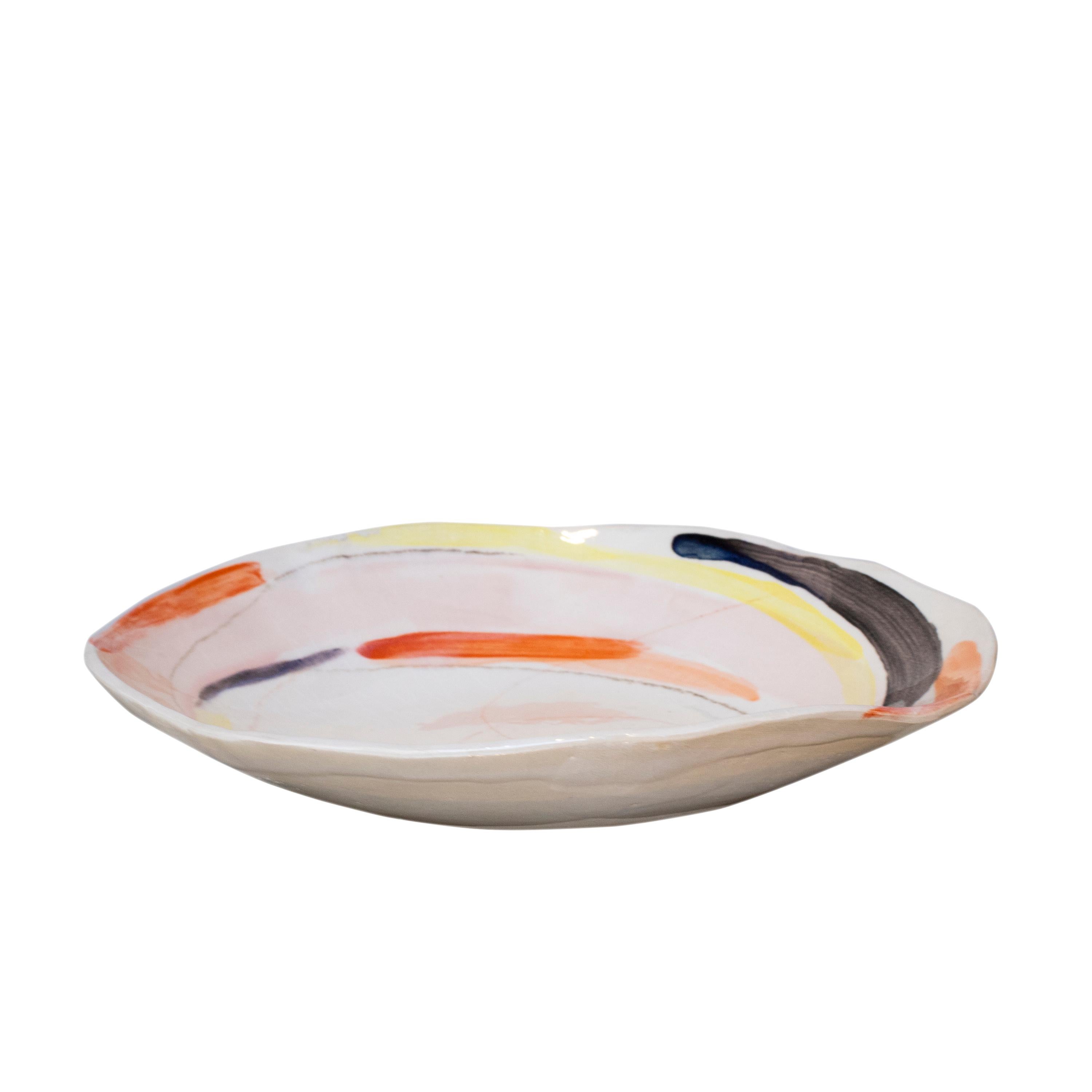 Handcrafted and painted modern platter designed by Spanish artist Ana Laso.

ANA LASO BAEZA is an artist from Madrid who develops her activity fundamentally as a painter and, for a few years, also as a ceramicist. She trained pictorially at the