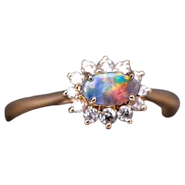 Jeu de couleurs Opale Boulder Bague de fiançailles halo diamant or 18K