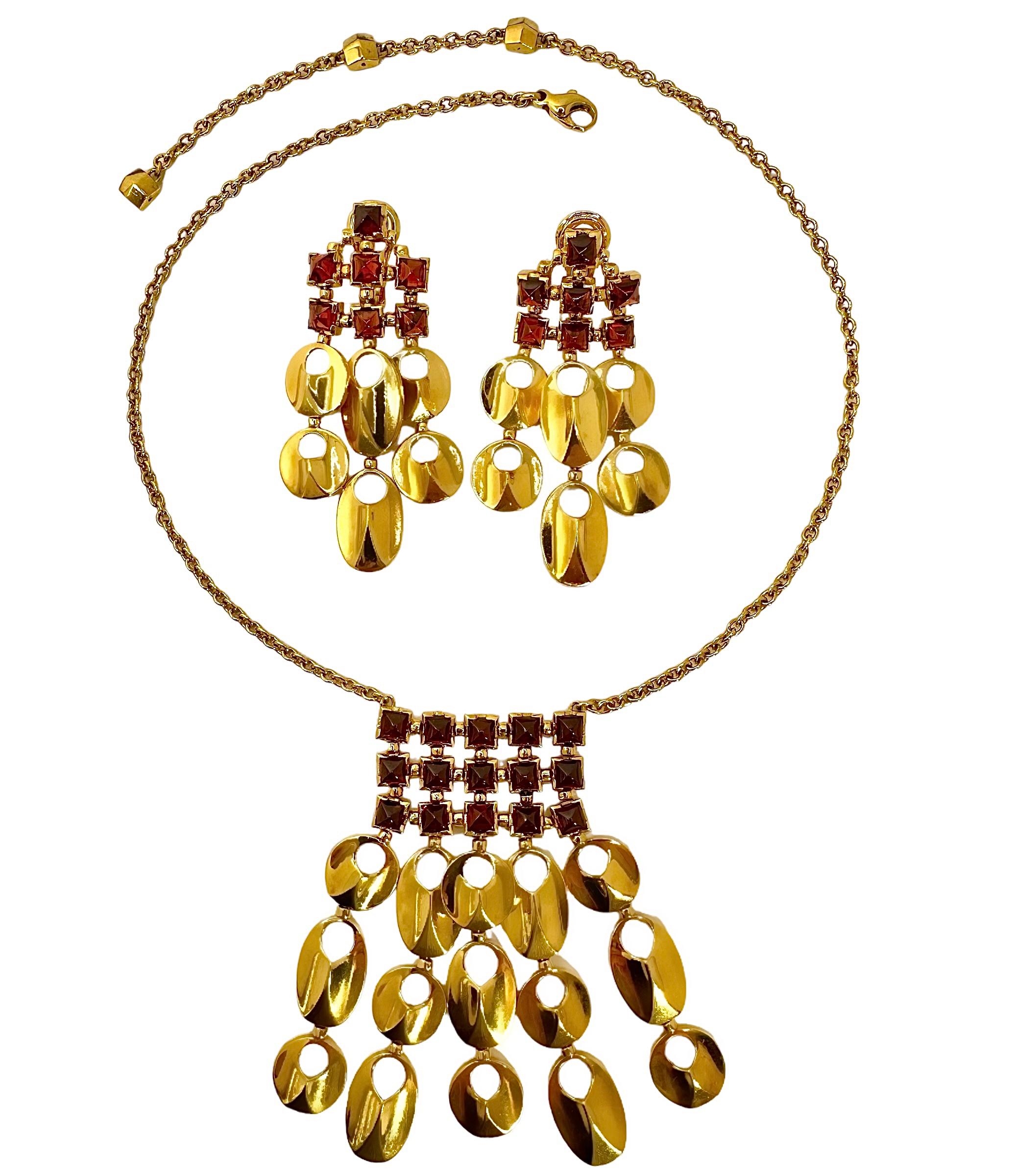 This opulent and dramatic necklace and earring set is devoid of any markings but absolutely has all of the ear marks of a fine Italian manufacturer. Each of of the twenty nine 4mm square Rio Madera Citrine cabochons add drama and interest to the