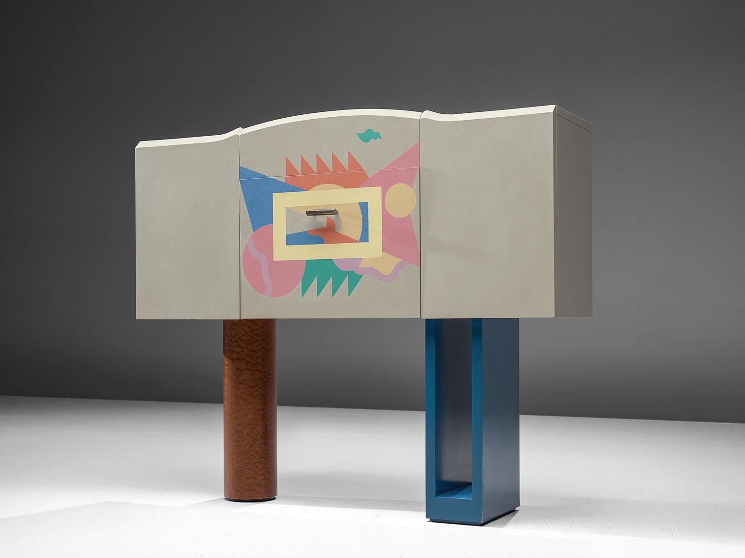 Alessandro Mendini, cabinet/bar, plywood and plastic, Italy, 1985.

This distinct and polychrome cabinet is exemplary for the postmodern interior design of the 1980s. This bar is designed by Alessandro Mendini (1931-) is an Italian artist and