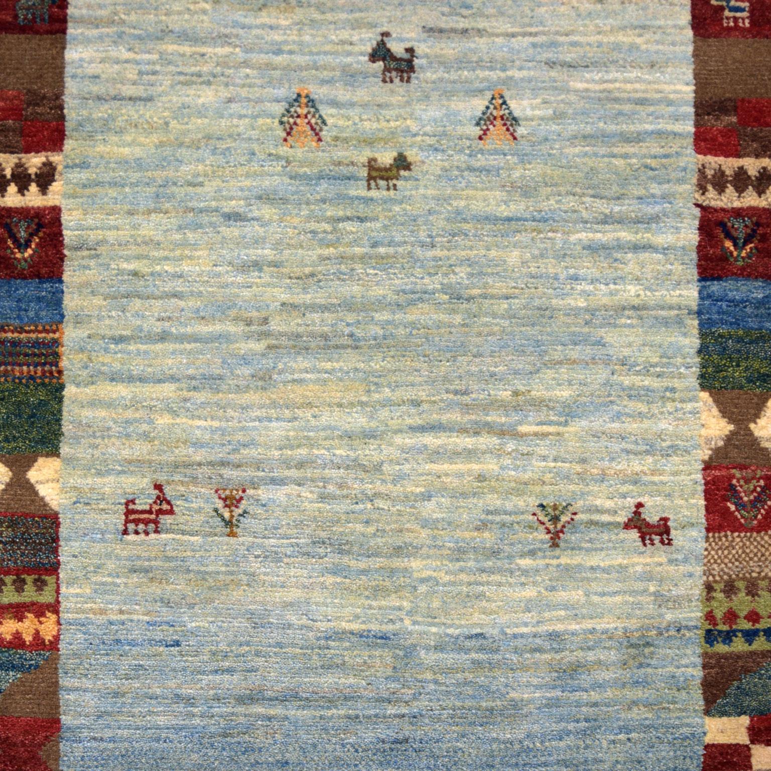 Woven in Iran, this Persian carpet measures 2’8” x 4’4” and is part of Orley Shabahang’s World Market Collection. To construct this carpet, the weaver utilized a Persian weaving technique. This hand-knotting technique originates from Persia and