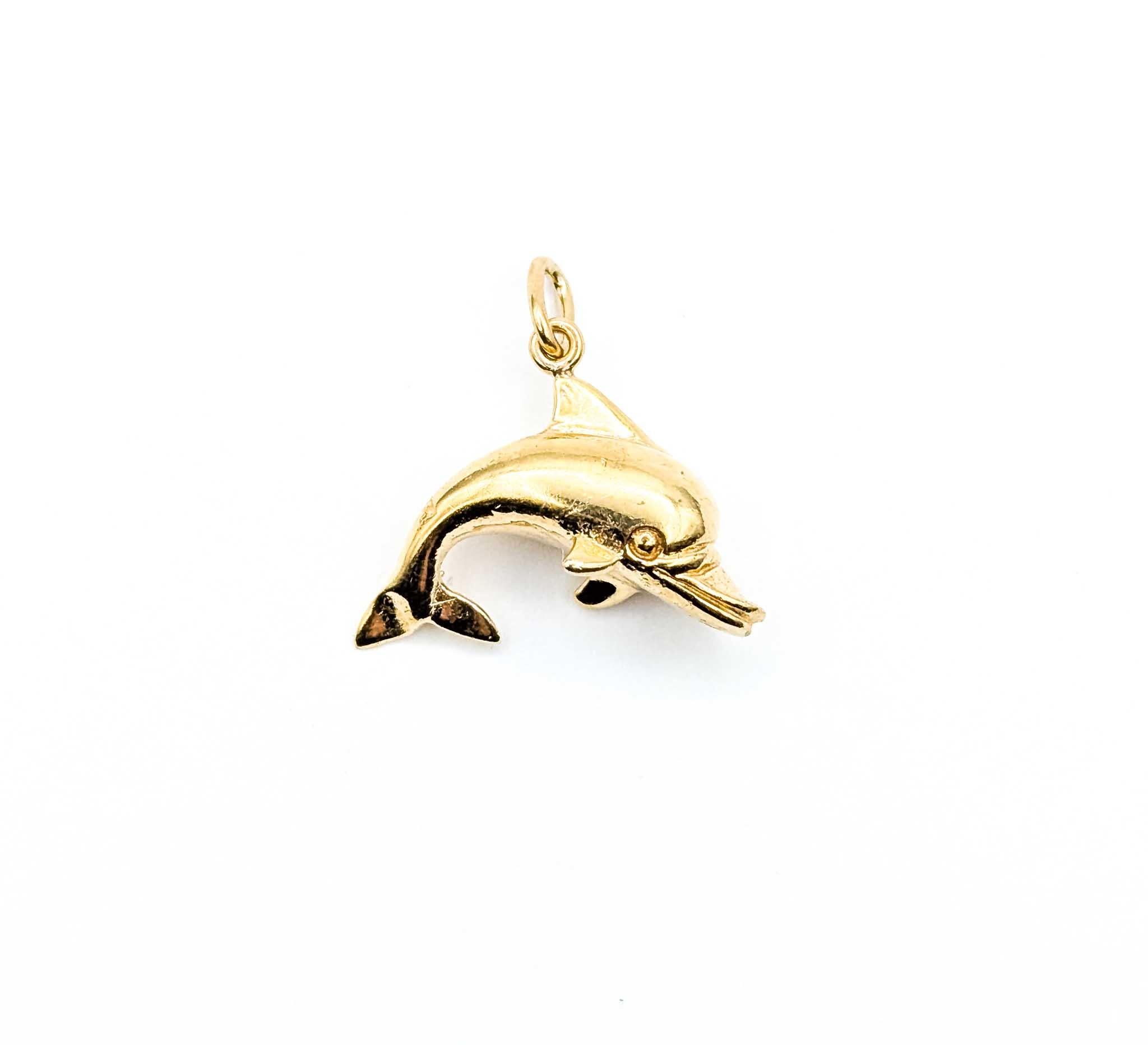 Contemporary Playful Dolphin Pendant in 14k Yellow Gold For Sale