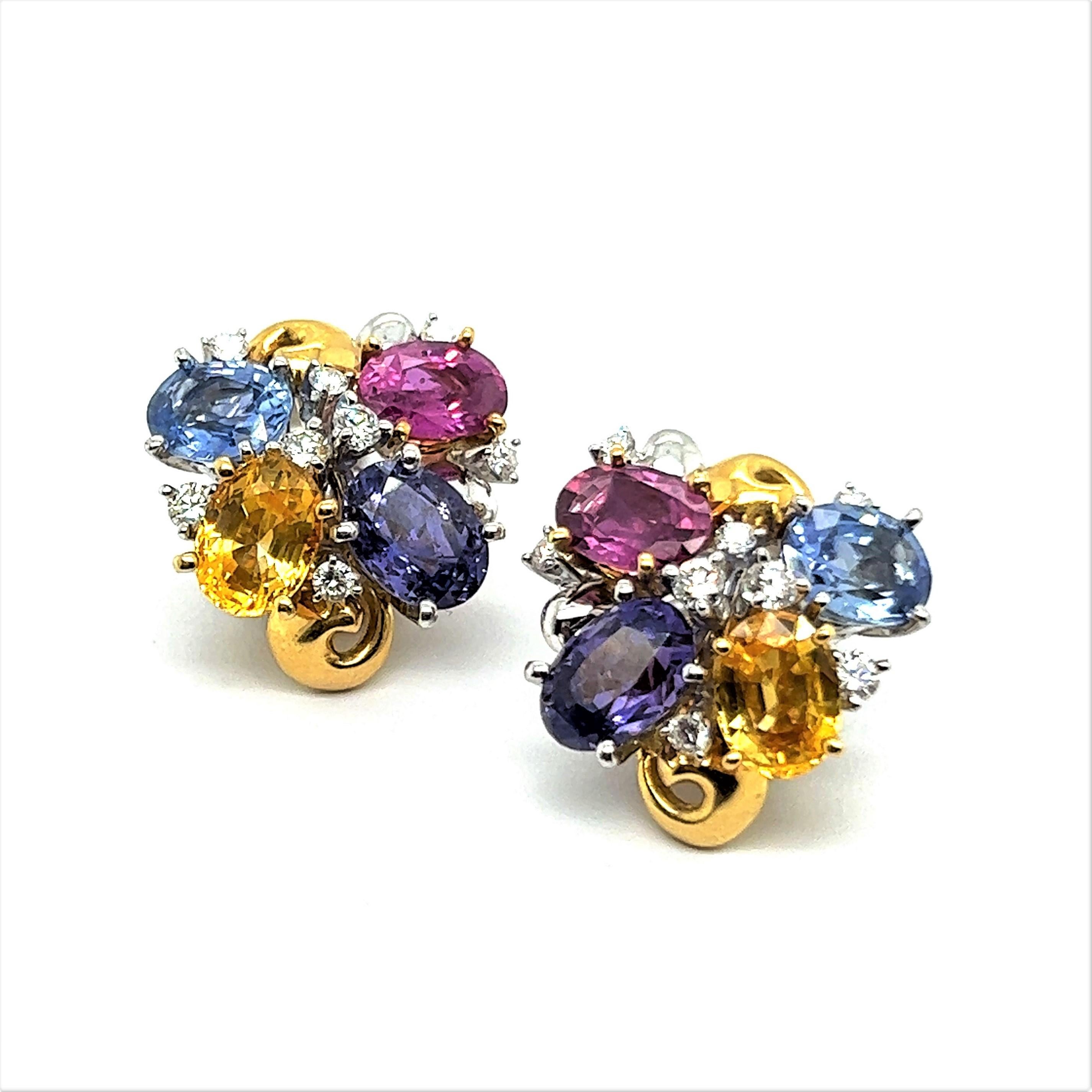 A celebration of colour – playful sapphire clip-on earrings in 18 Karat white and yellow gold. 

These “rainbow lollipops” are a cluster of natural sapphires in various shades of blue, yellow, purple and pink. The gemstones are all oval cut and have