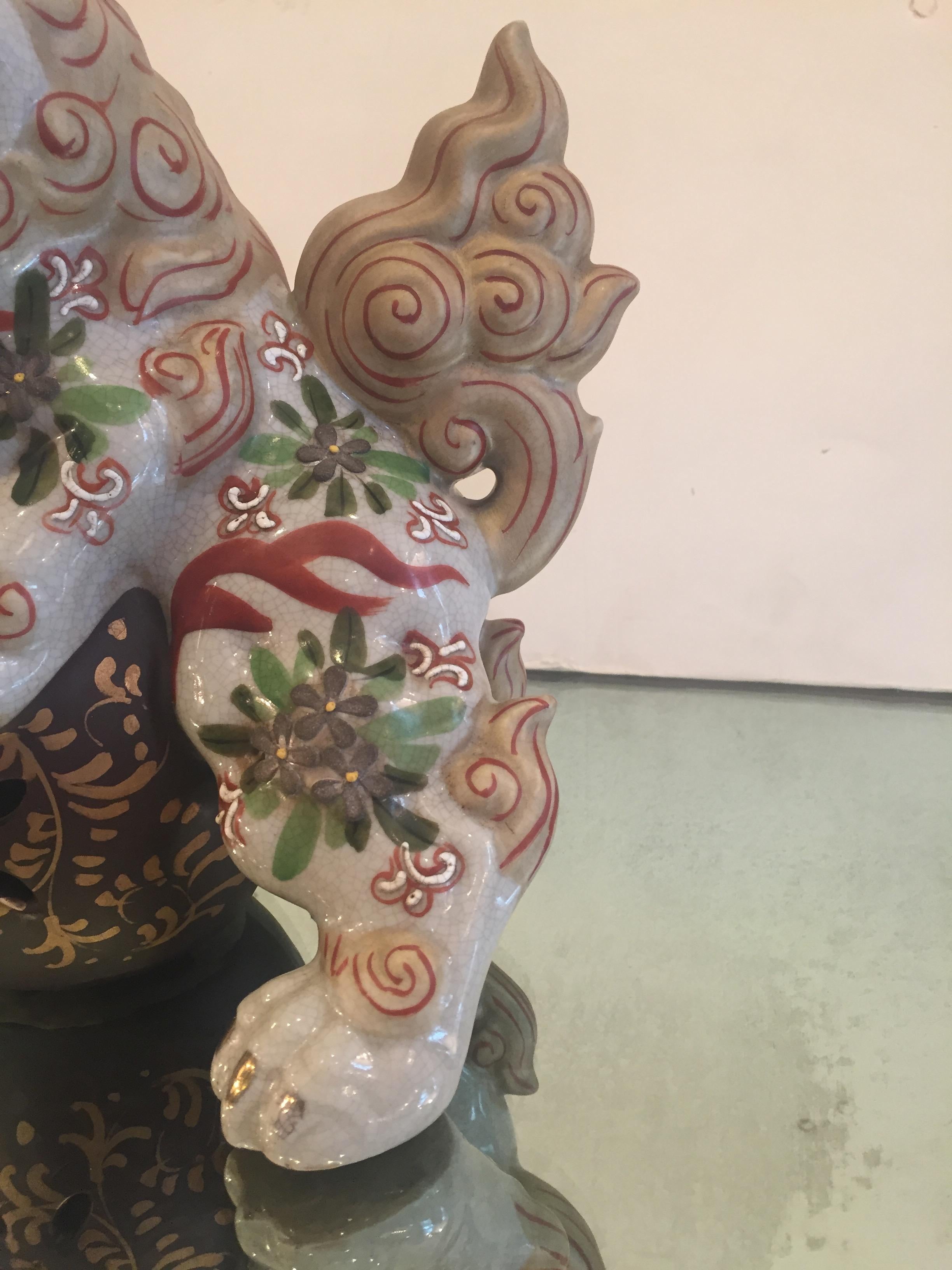 Mid-20th Century Playful Pair of Chinese Porcelain Foo Dogs